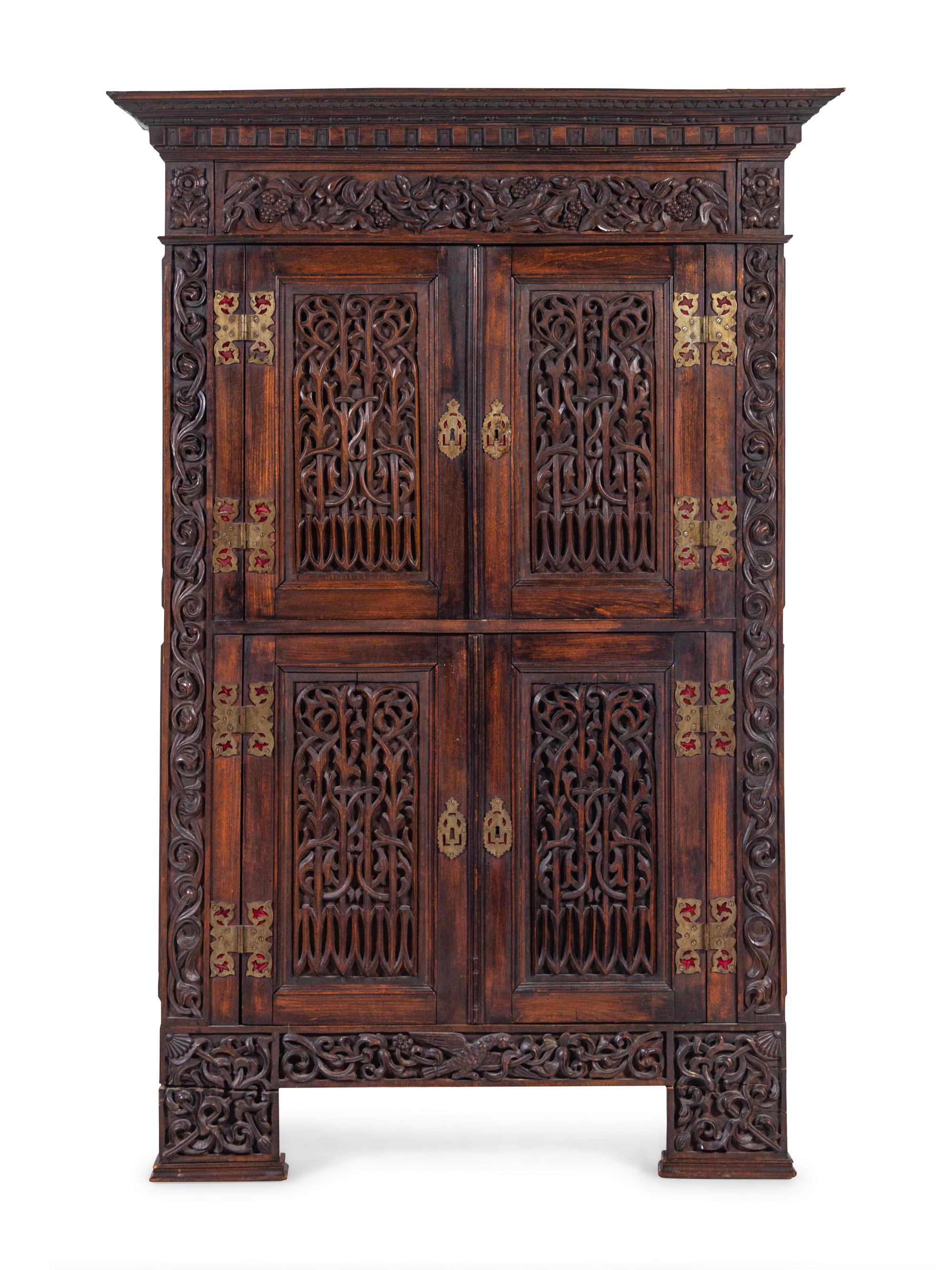 A French Carved Walnut Cabinet