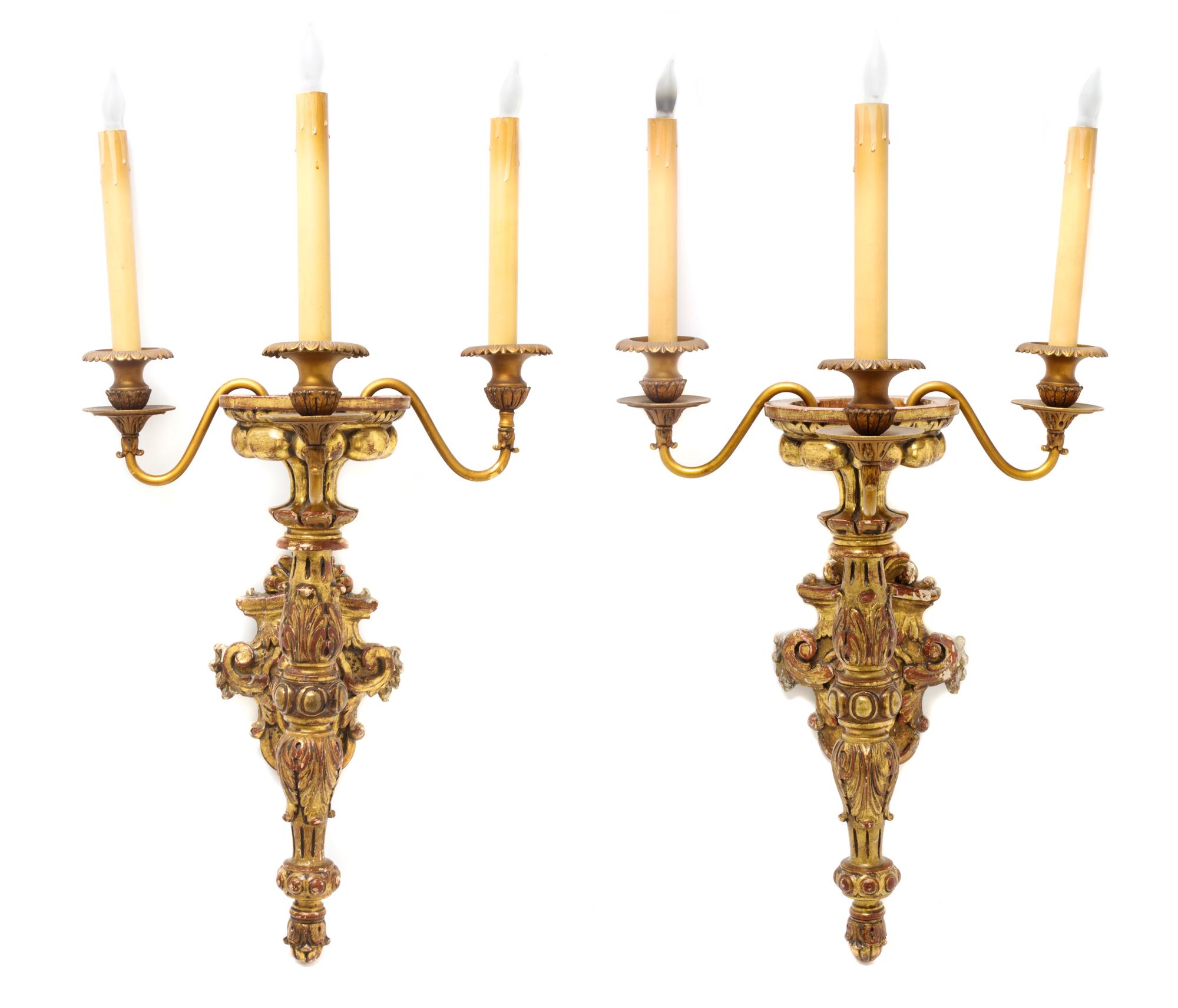 A Pair of Neoclassical Giltwood Three-Light Sconces, Height 30 inches.