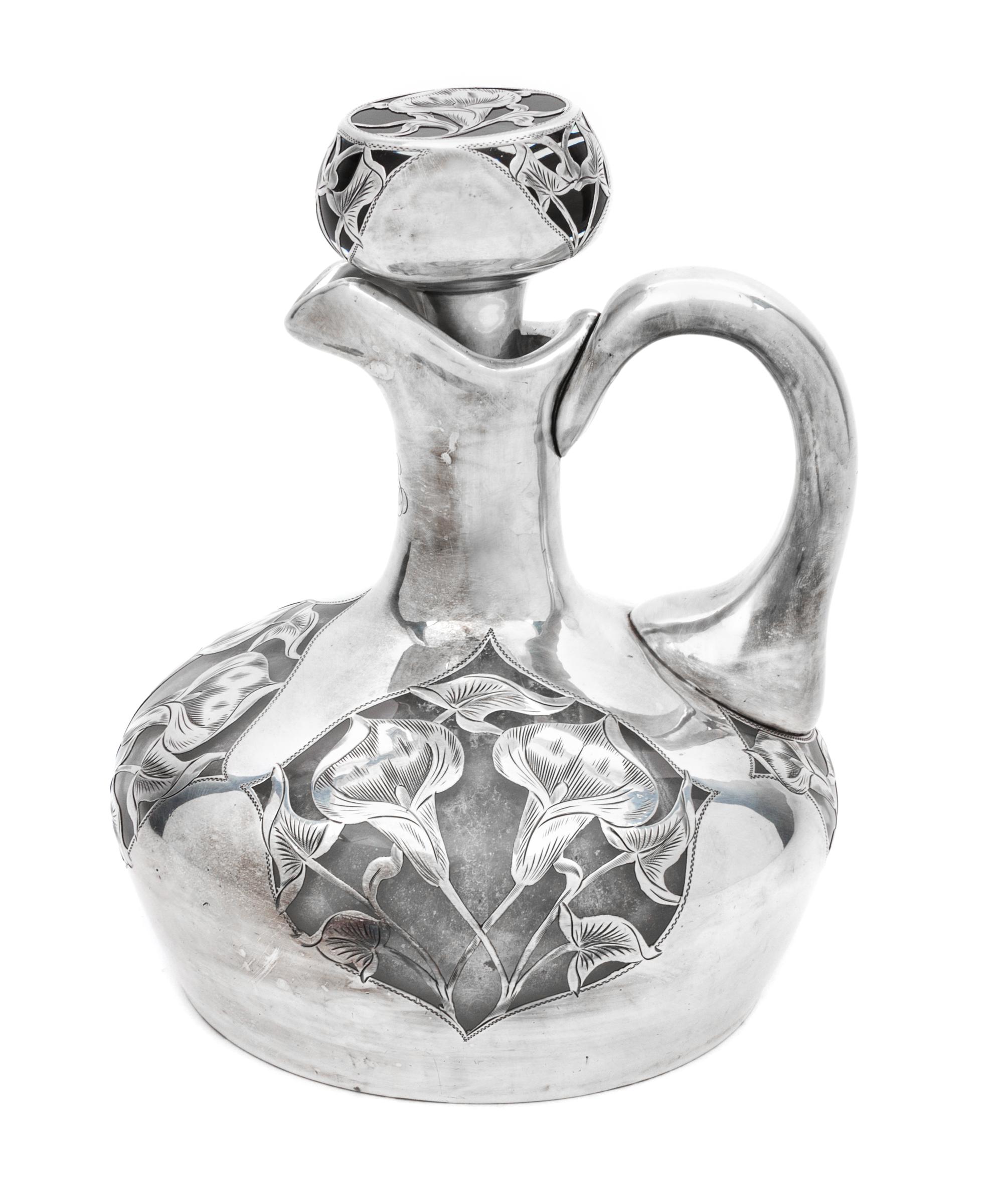 An Art Nouveau Silver Overlay Ewer Height 7 inches.