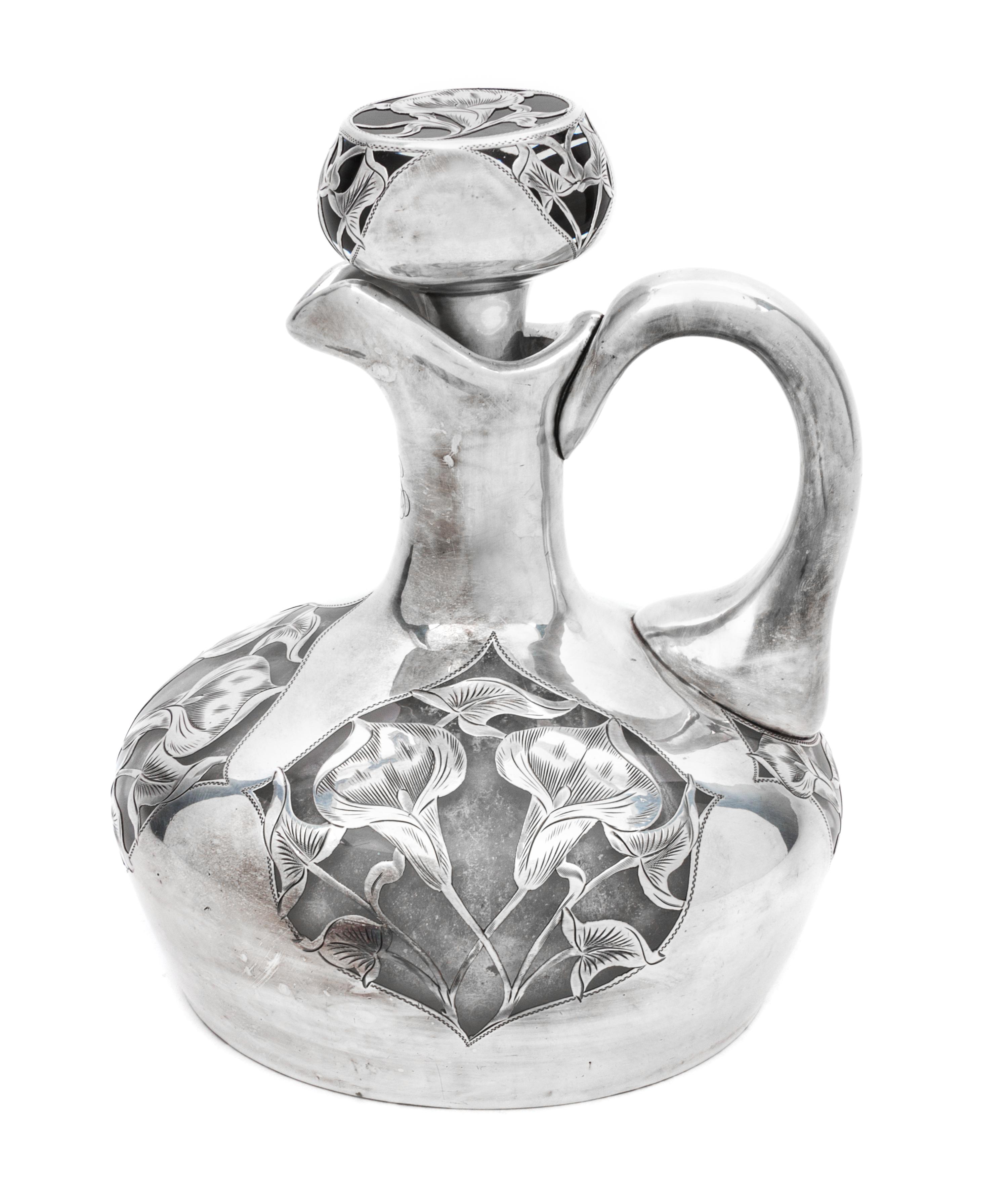 An Art Nouveau Silver Overlay Ewer Height 7 inches.