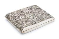 A Silver Filigree Cigarette Case, , the case centered with a flowerhead among foliate scrolls.