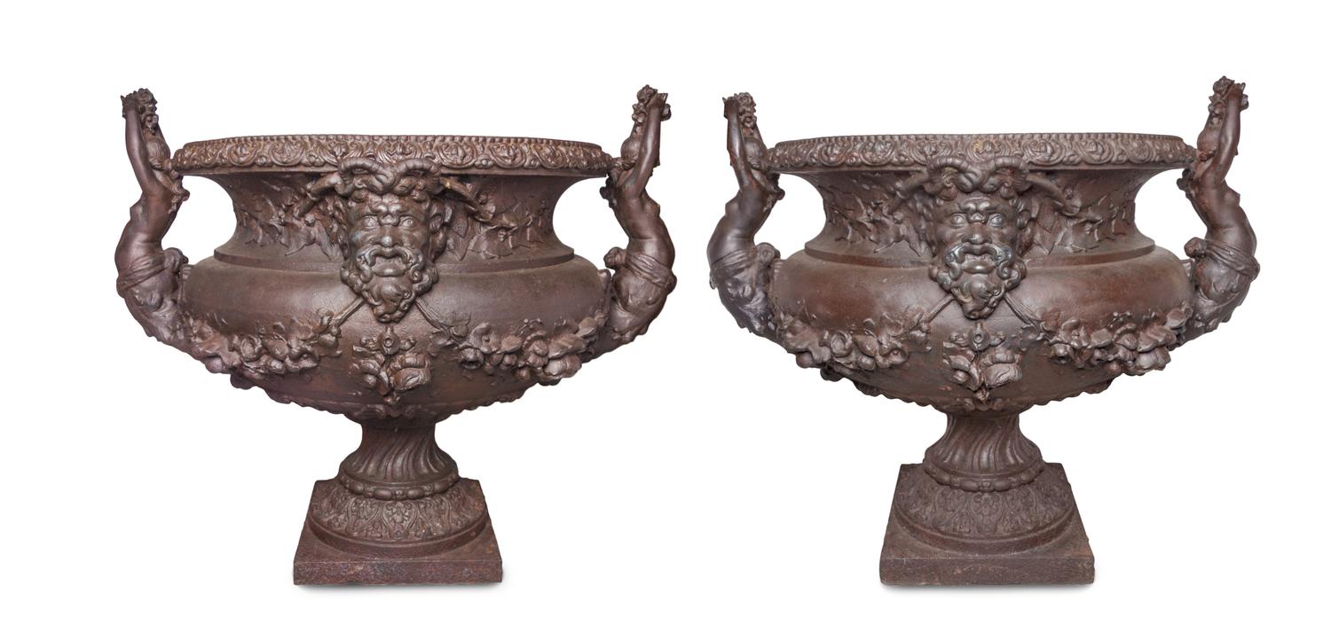 A Pair of Victorian Style Cast Iron Urns Height 35 inches. — 20TH CENTURY