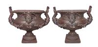 A Pair of Victorian Style Cast Iron Urns Height 35 inches. — 20TH CENTURY