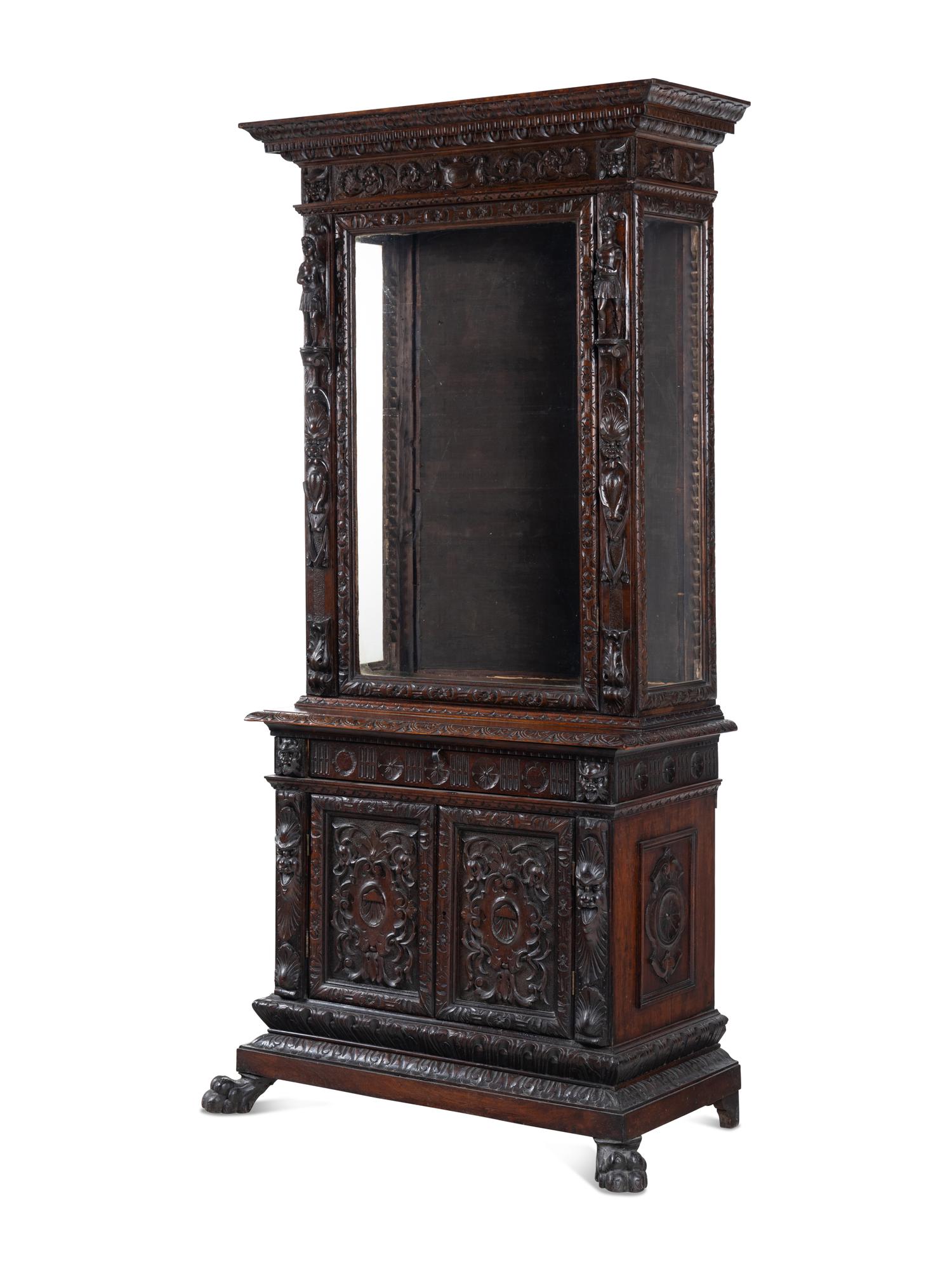 An Austrian Carved Walnut Cabinet