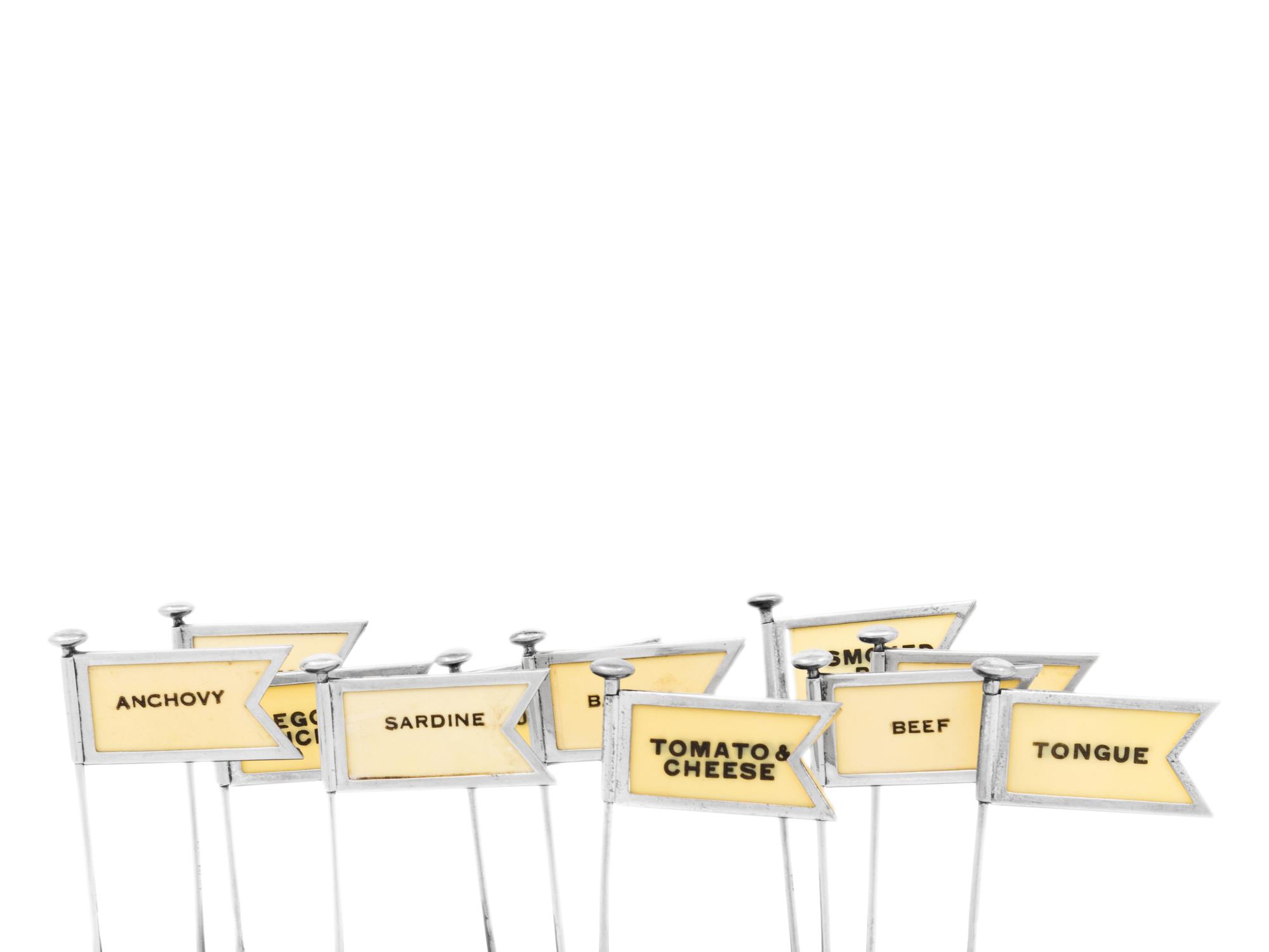 A Set of Eleven English Silver Sandwich Tags