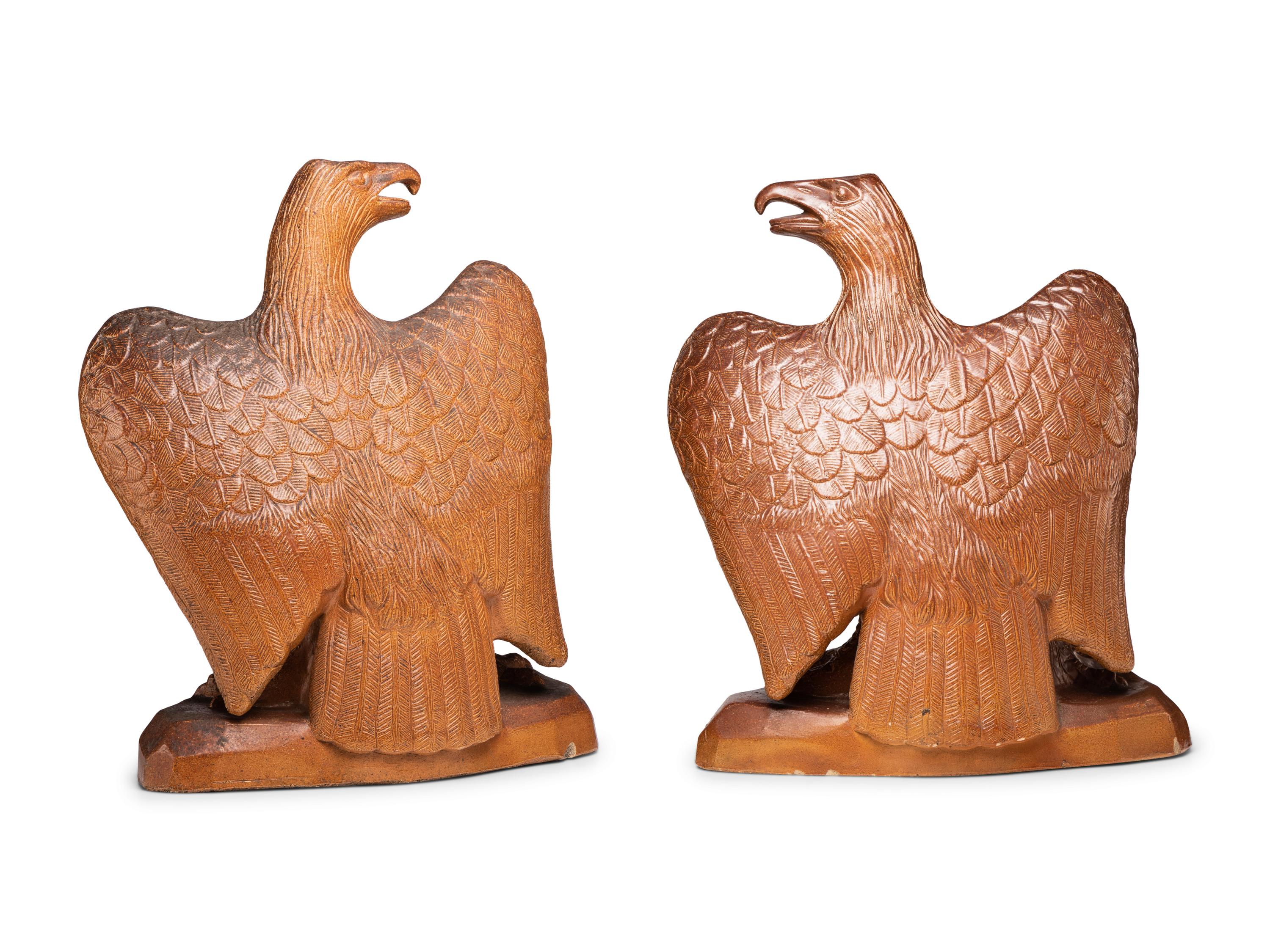 A Pair of Monumental Sewer Tile Eagles