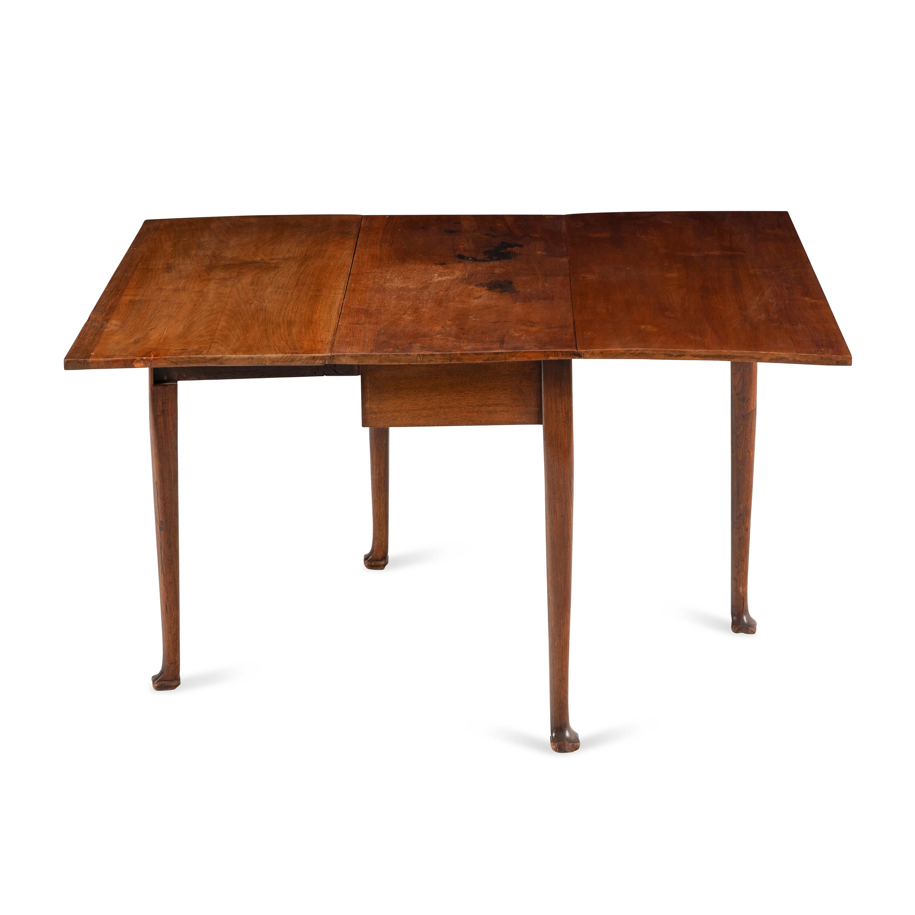 A Queen Anne Style Walnut Drop-Leaf Table