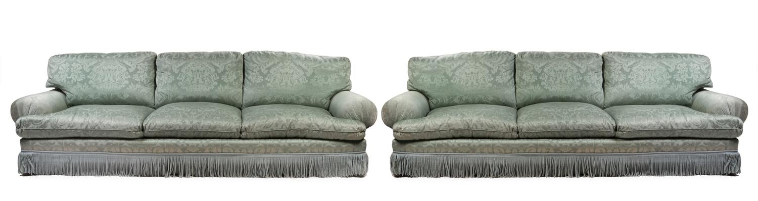 A Pair of Silk Damask Upholstered Three-Seat Sofas Width 120 inches.