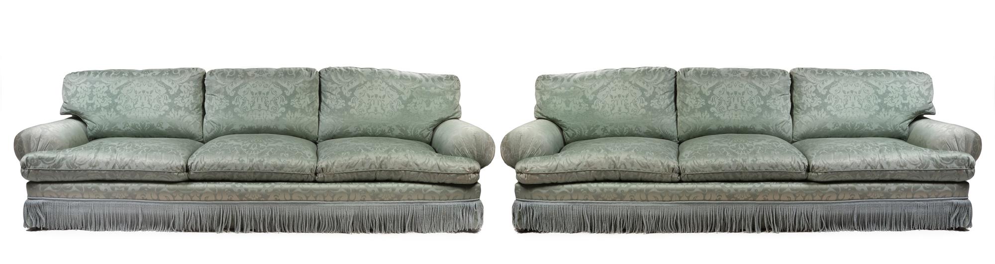 A Pair of Silk Damask Upholstered Three-Seat Sofas Width 120 inches.