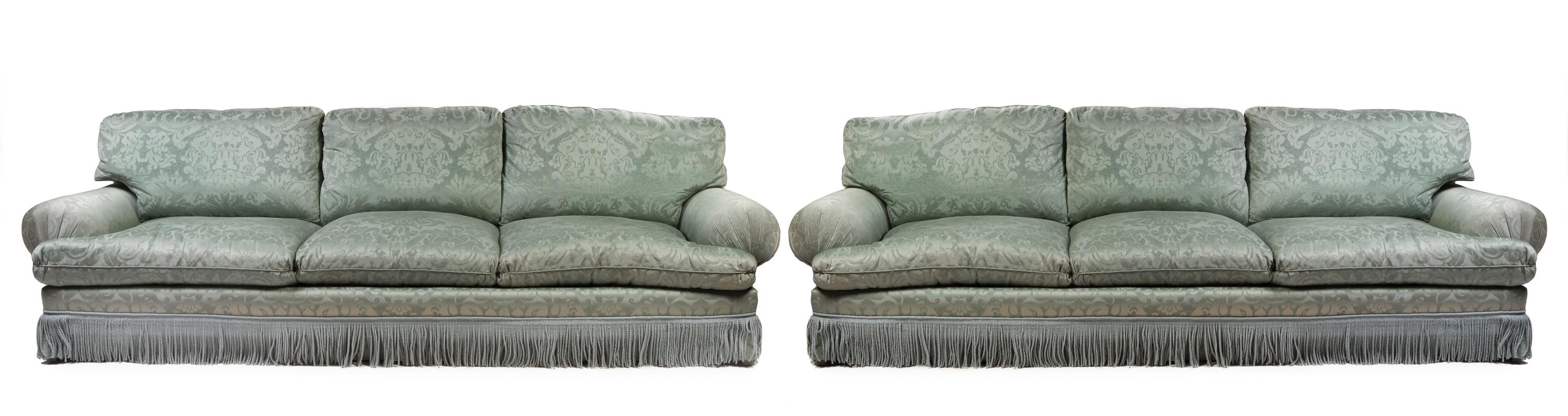 A Pair of Silk Damask Upholstered Three-Seat Sofas Width 120 inches.