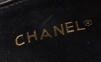 A Chanel White Leather Quilted Handbag, 10.5" x 8".
