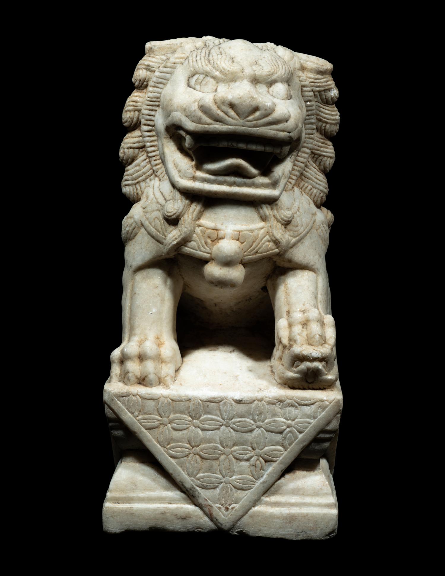 A Chinese Carved White Mable Figure of Fu Lion