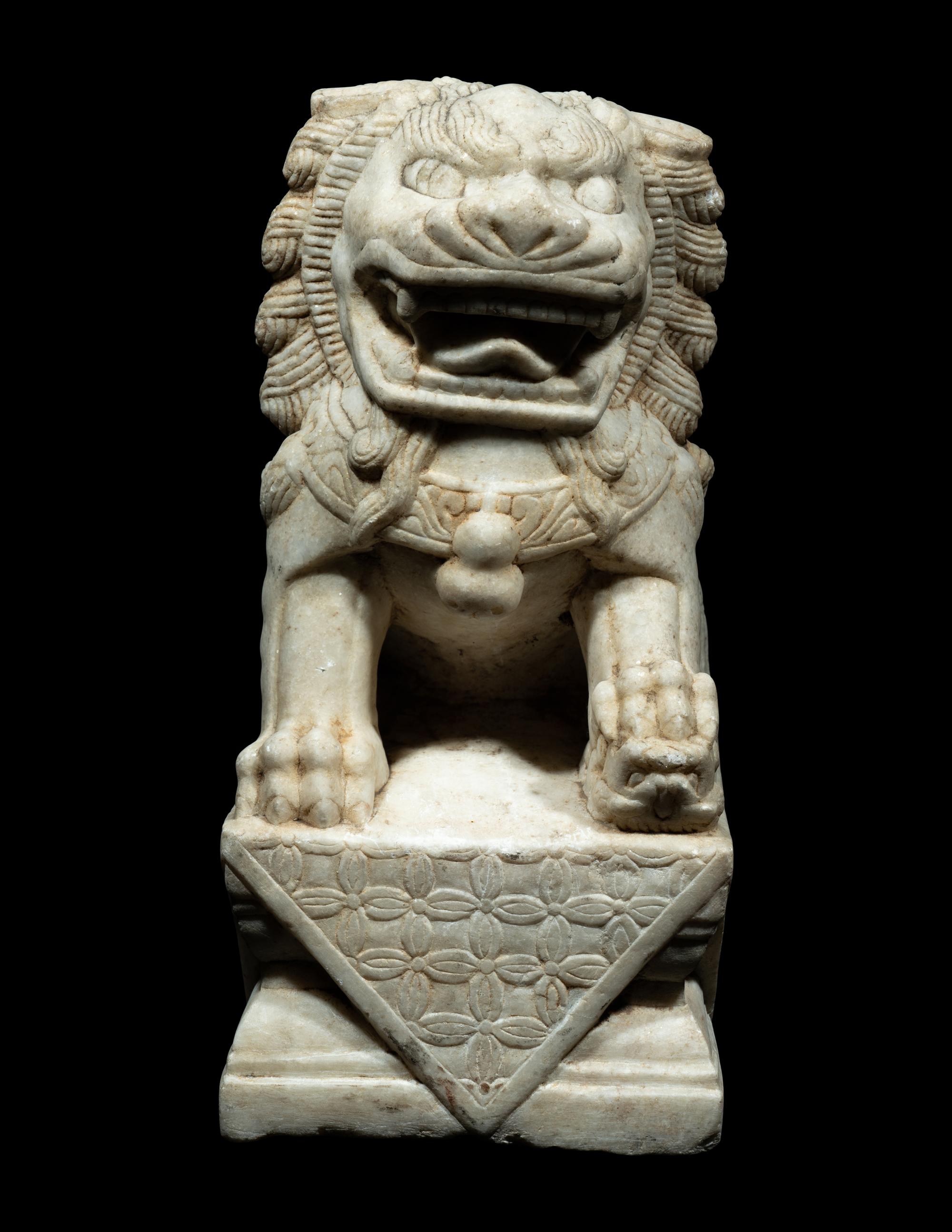 A Chinese Carved White Mable Figure of Fu Lion