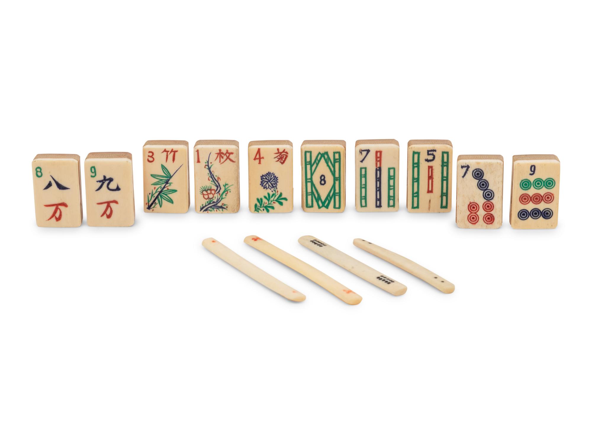 A Chinese Hardwood and Bone Mah Jong Set