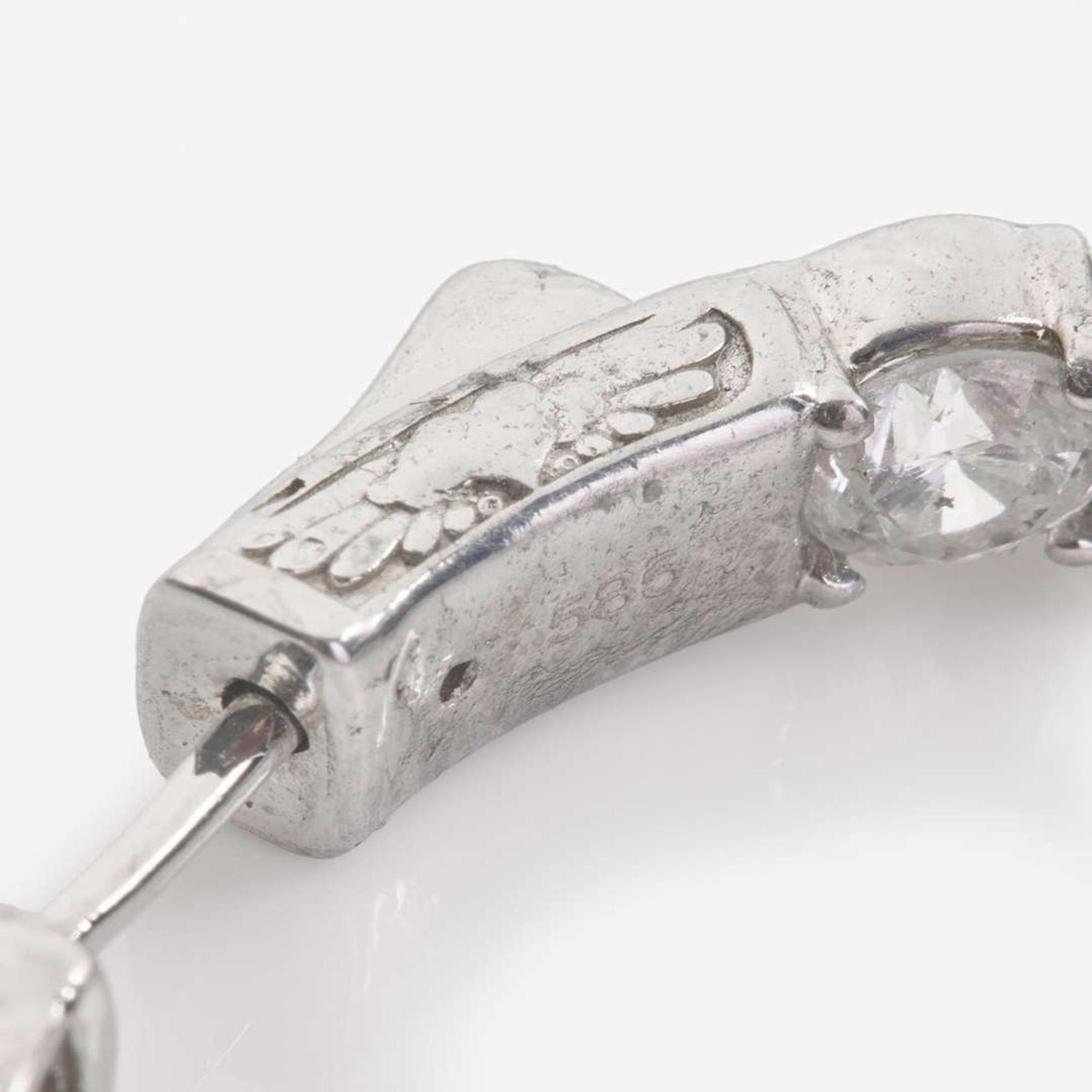 A Pair of 14K White Gold and Diamond Hoop Earrings