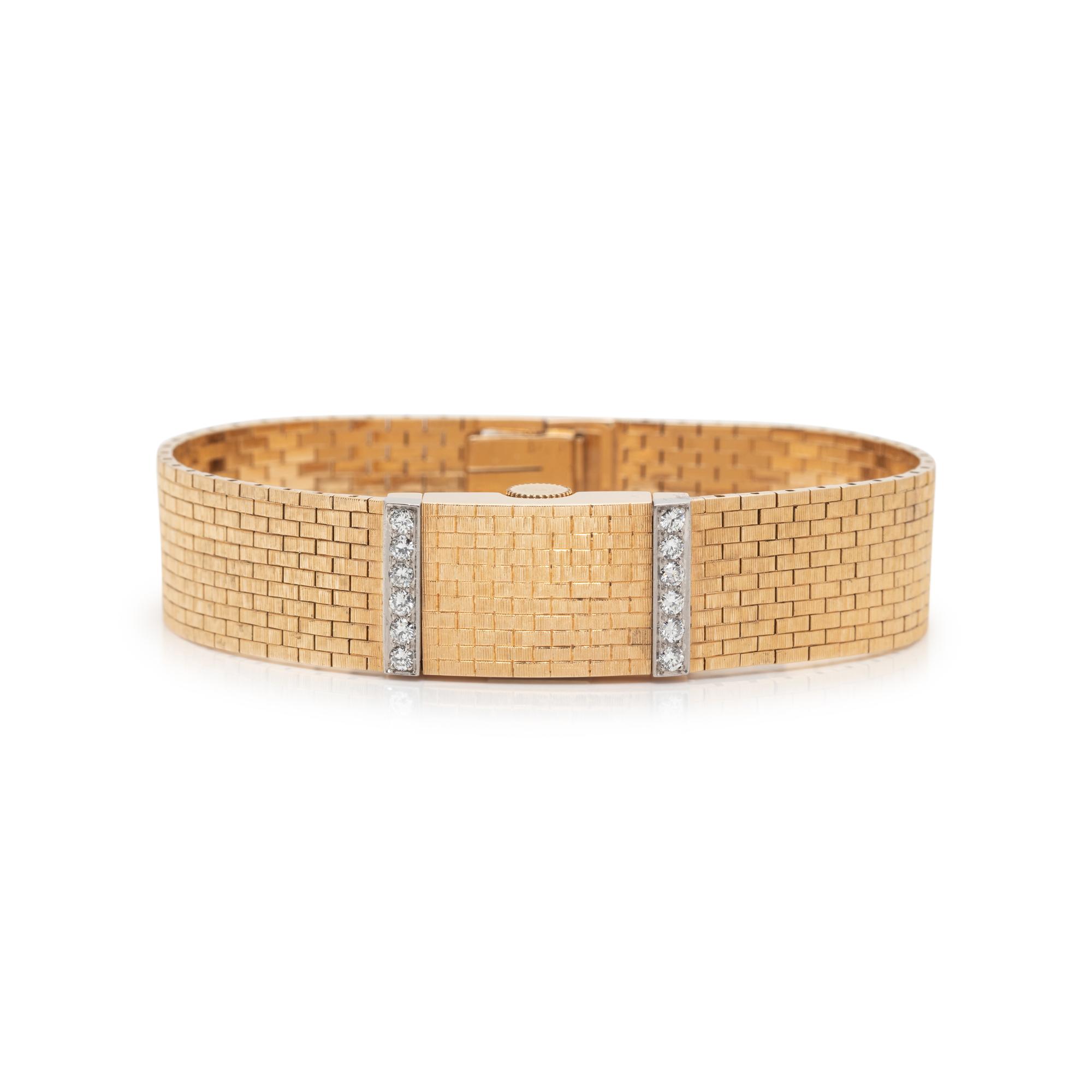 TIFFANY & CO., 14K YELLOW GOLD AND DIAMOND SURPRISE WATCH