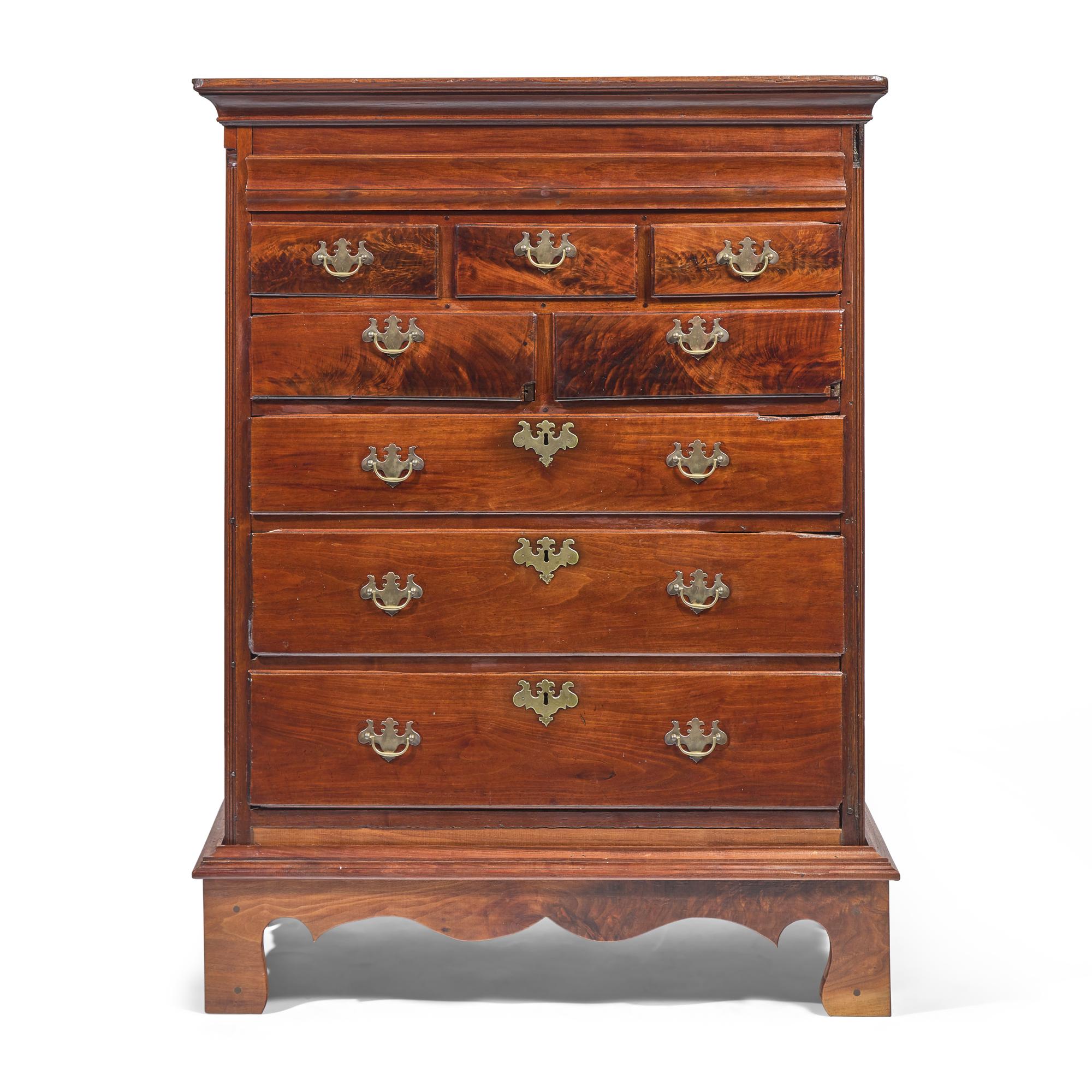 A Queen Anne Carved Walnut Tall Chest on Later Wood Frame