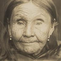 Edward S. Curtis (1868-1952) Untitled portrait (Native American Woman in Plaid Shawl,) c. 1900