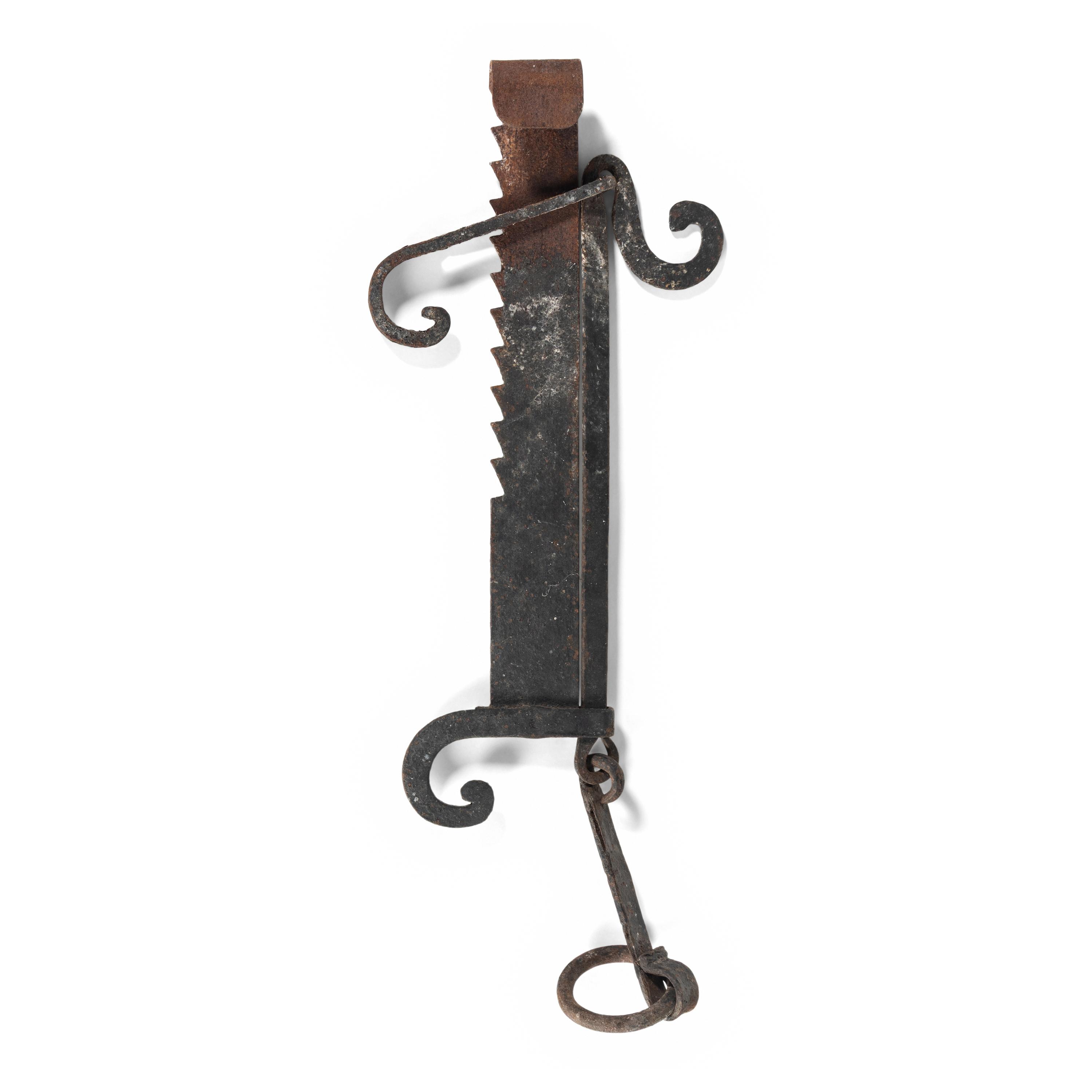 A French Hand-Forged Iron Crémaillère de Cheminée