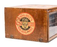 A Dewhurst's "Sylko" Stenciled Oak Spool Cabinet