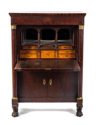 An Empire Gilt Metal Mounted Secretaire a Abbattant, Height 55 x width 39 x depth 20 inches.