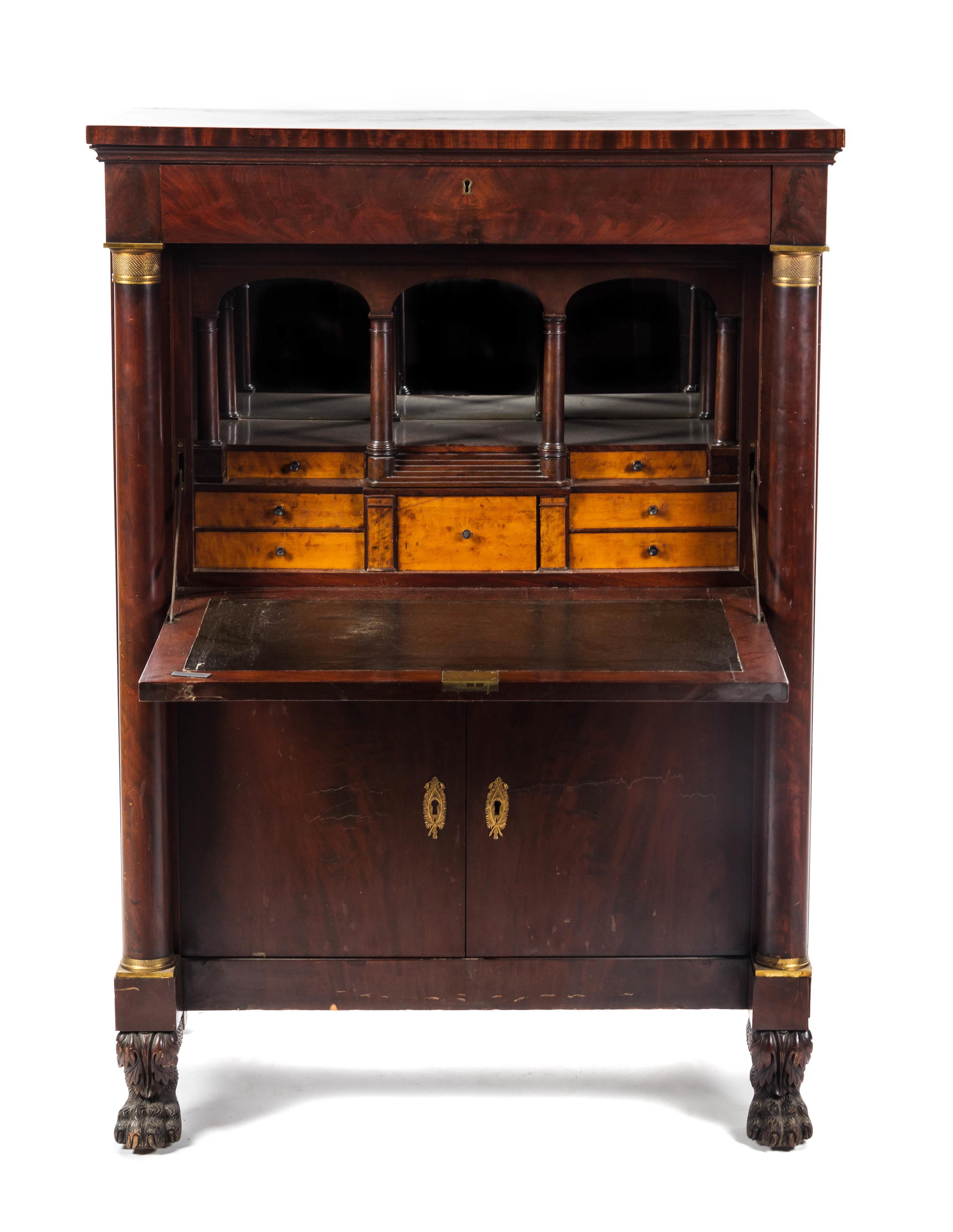 An Empire Gilt Metal Mounted Secretaire a Abbattant, Height 55 x width 39 x depth 20 inches.
