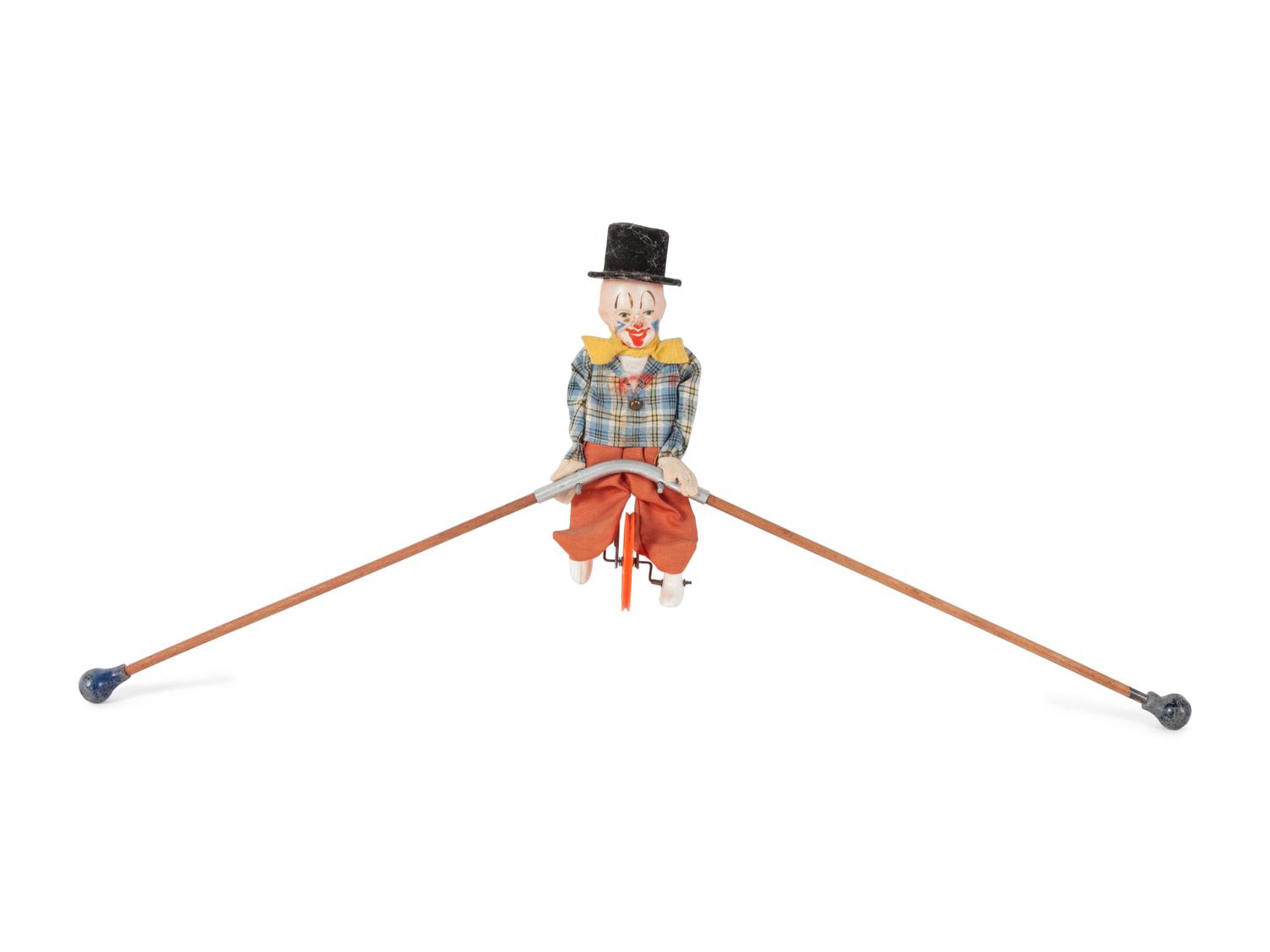 A Group of Children's Musical Instrument Toys and Tin Lithographed Mechanical Objects