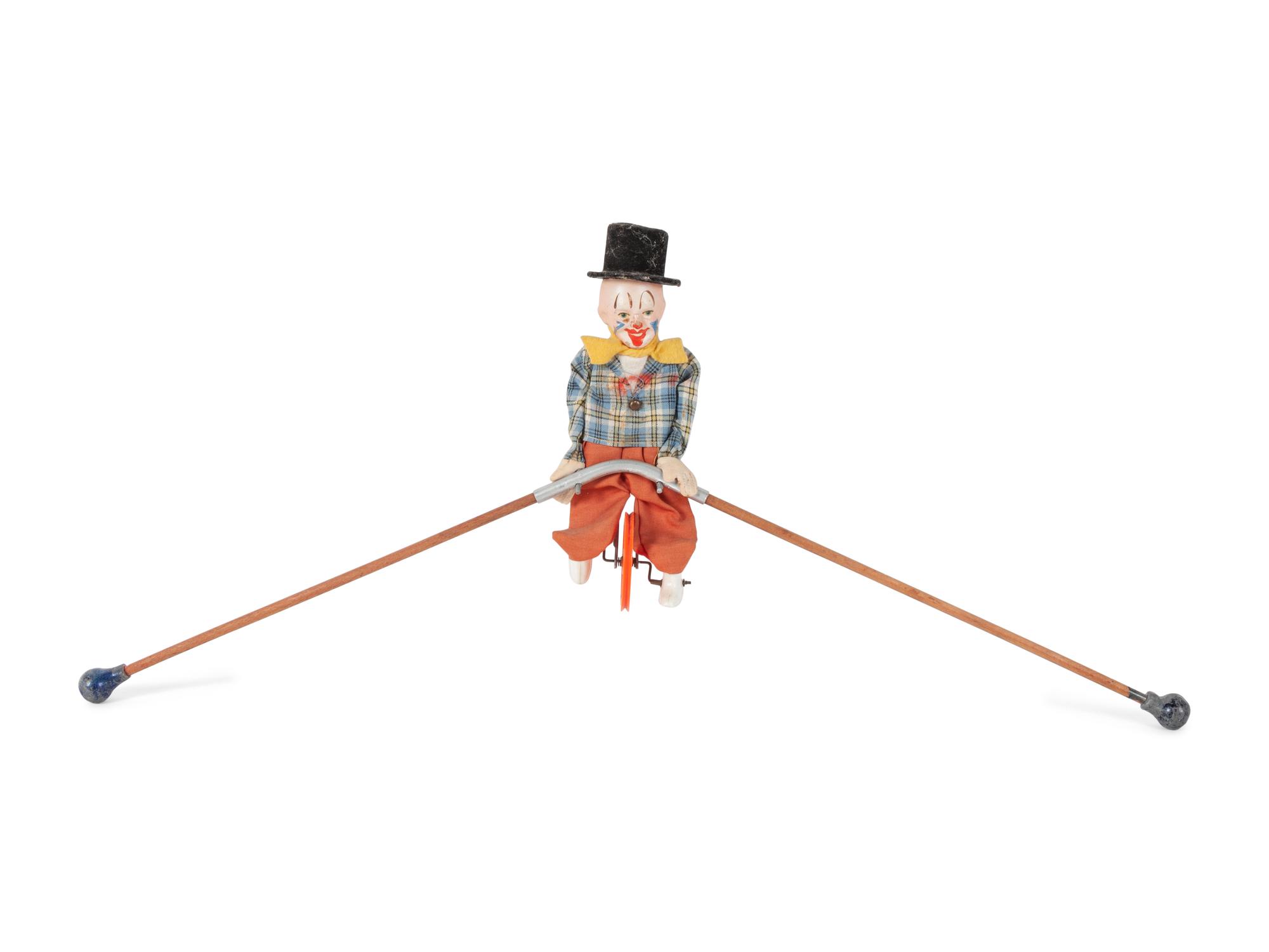 A Group of Children's Musical Instrument Toys and Tin Lithographed Mechanical Objects