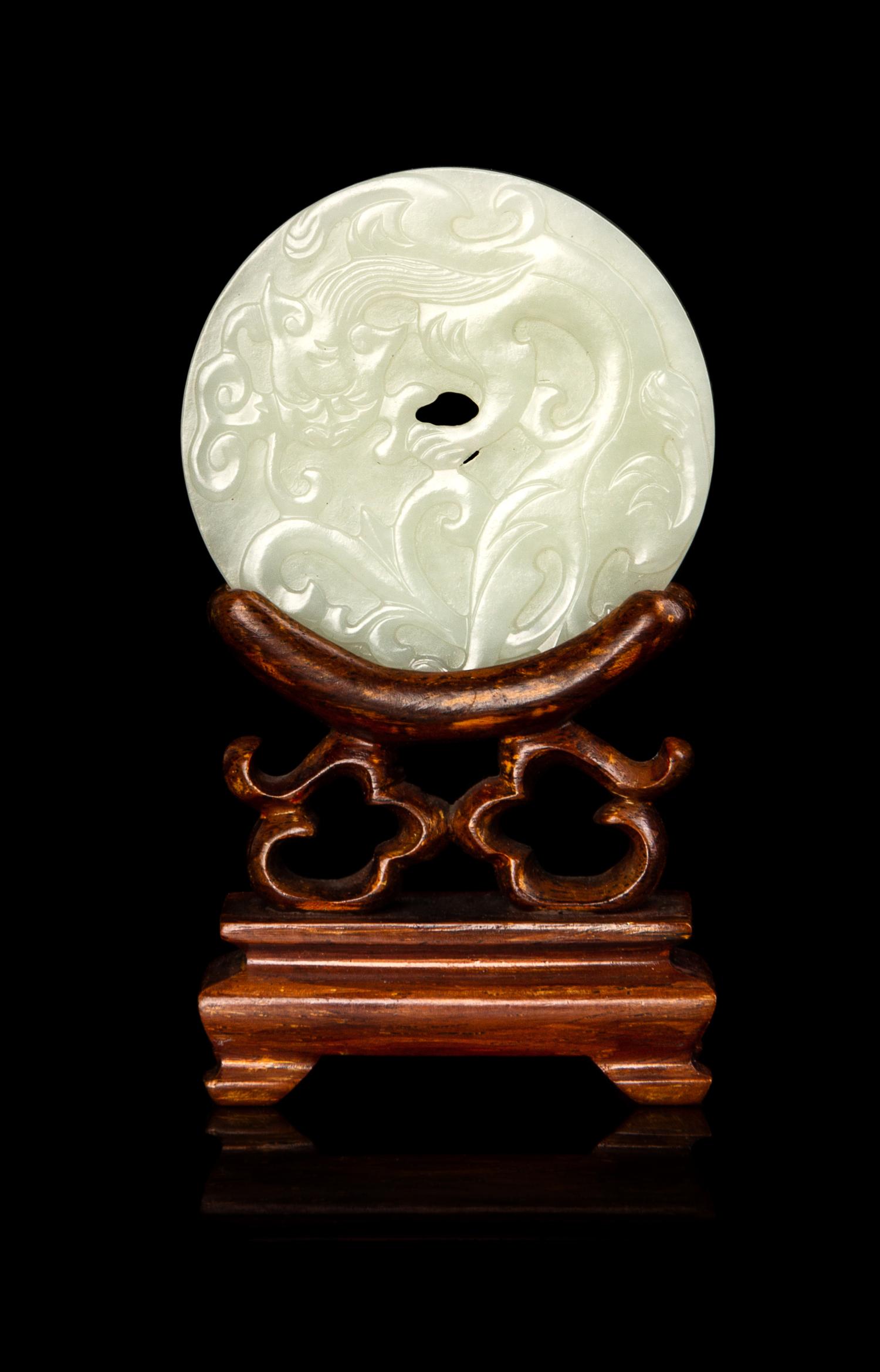 A Chinese White Jade Bi Disc