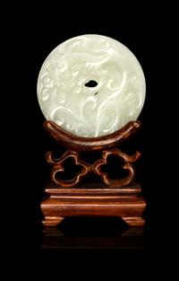 A Chinese White Jade Bi Disc