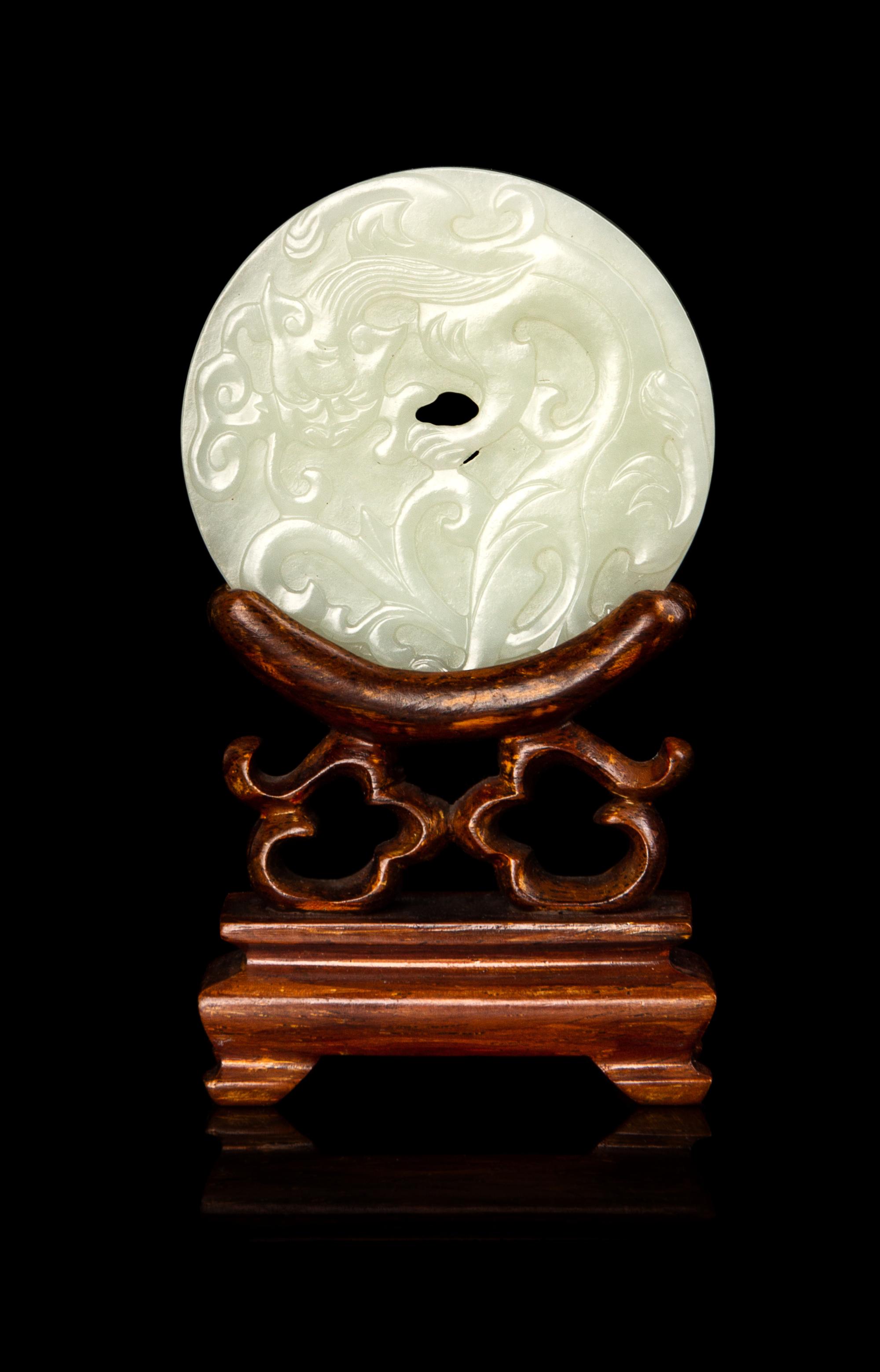 A Chinese White Jade Bi Disc