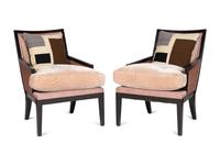 A Pair of Ebonised Bergères