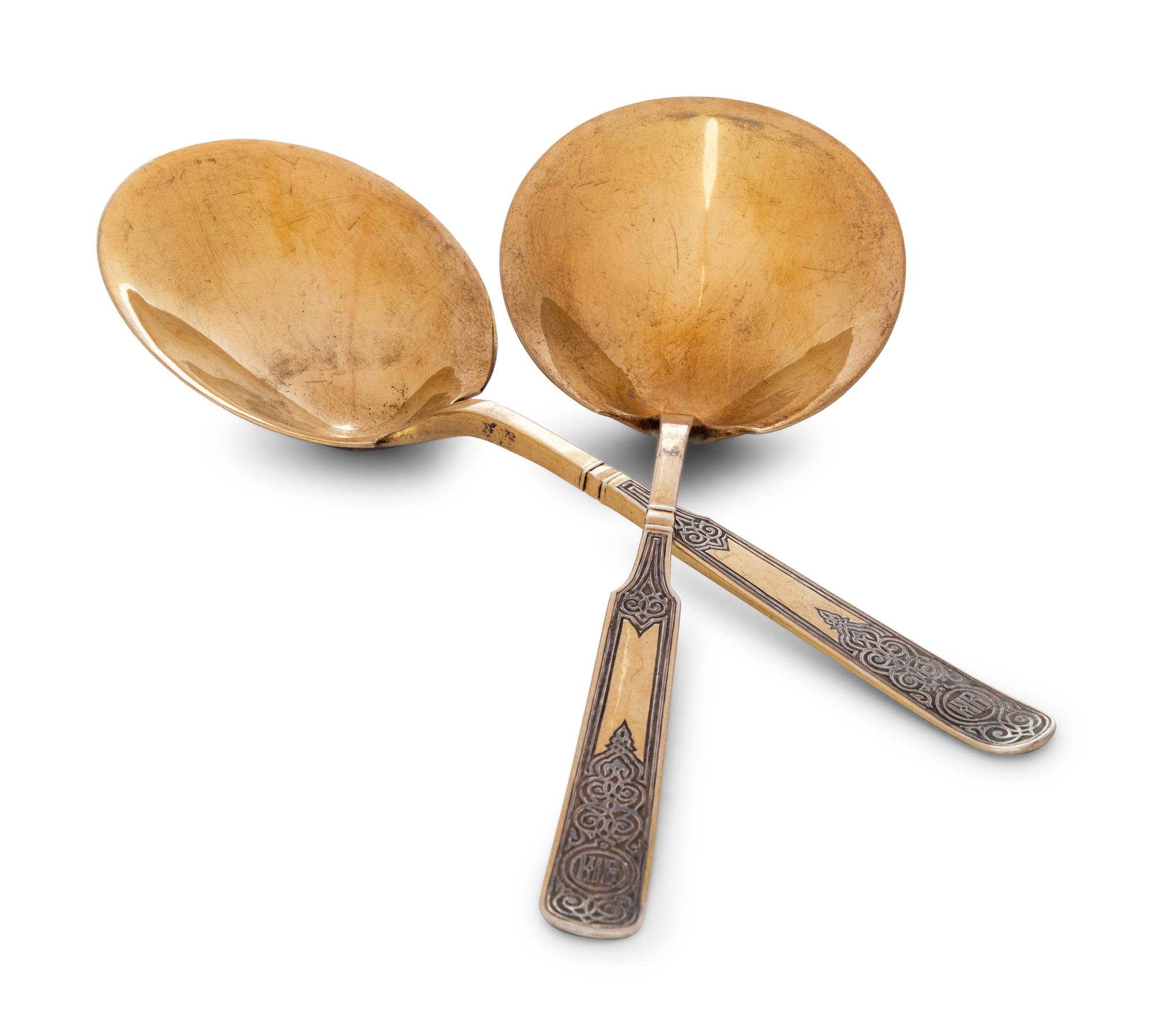 A Pair of Russian Niello Silver-Gilt Serving Spoons