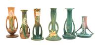 Six Roseville Pottery Bud Vases Height of tallest 7 1/2 inches.