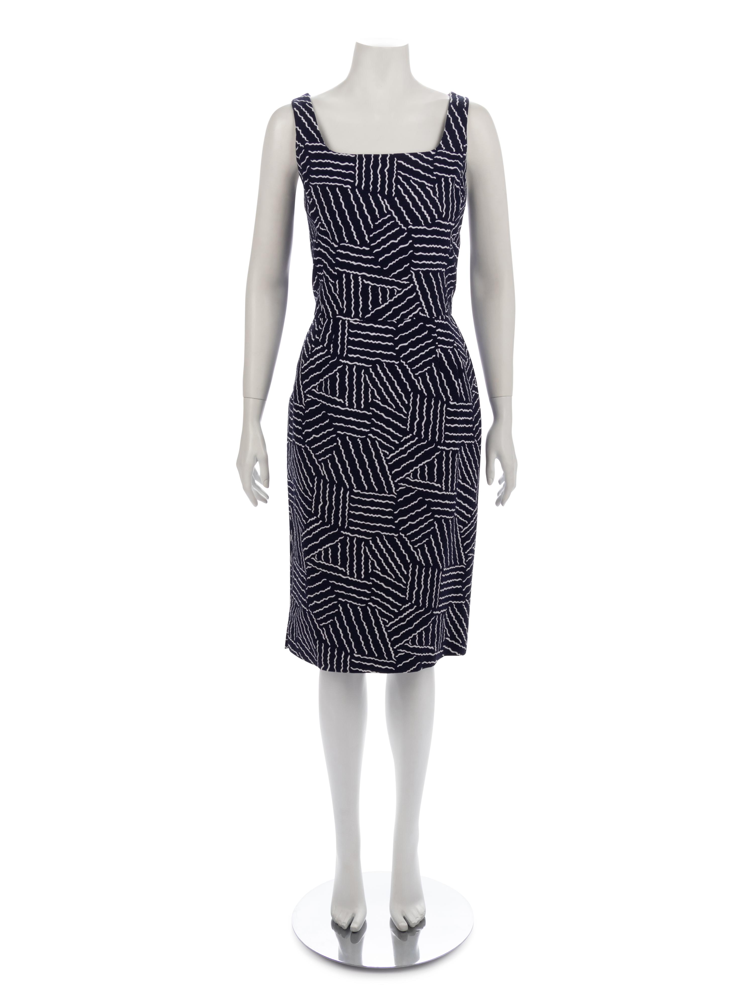 Two Designer Dress Suits: Carolina Herrera & Oscar de la Renta