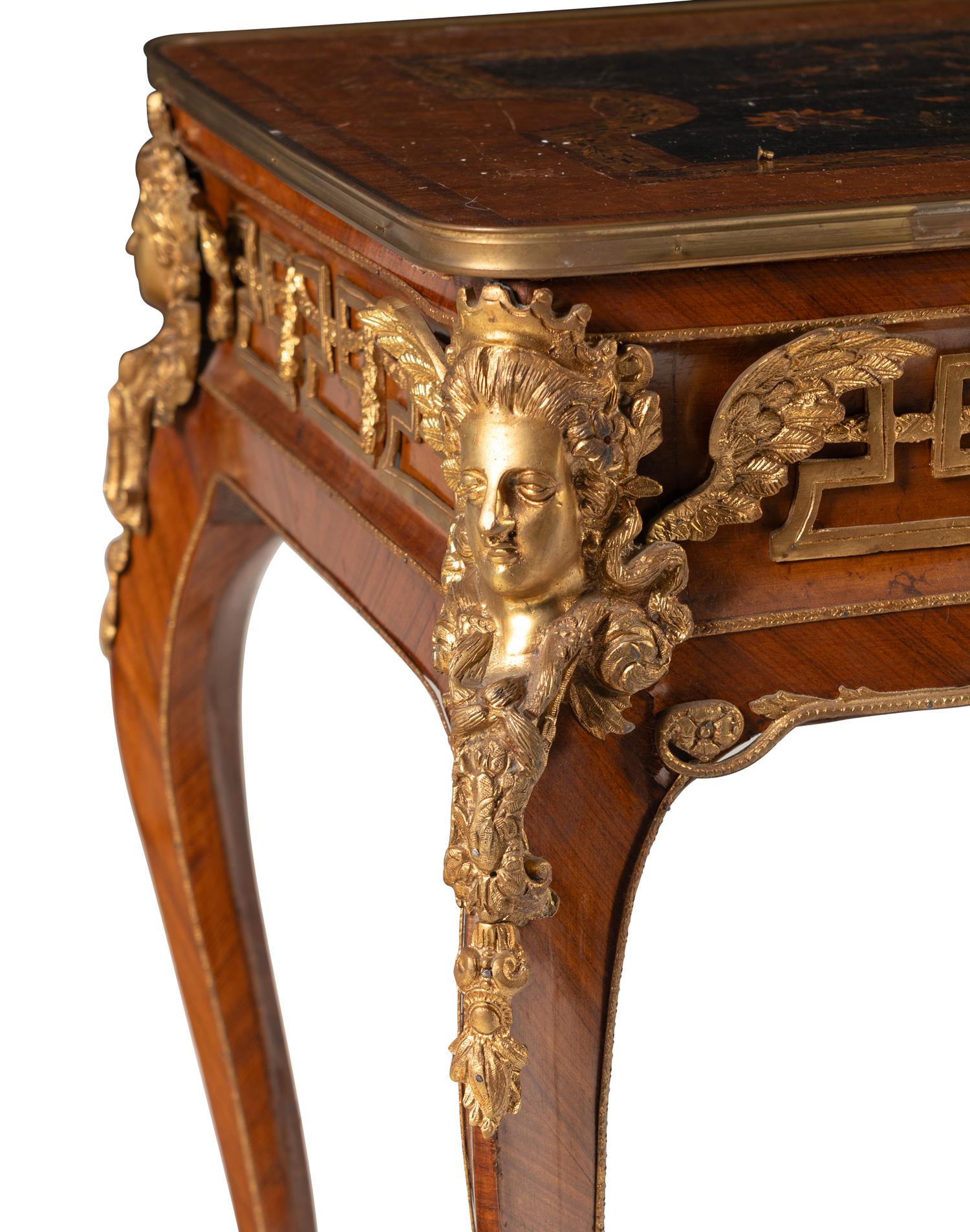 A Régence Style Gilt Bronze Mounted Kingwood and Floral Marquetry Table