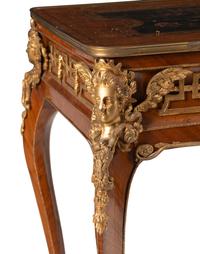 A Régence Style Gilt Bronze Mounted Kingwood and Floral Marquetry Table
