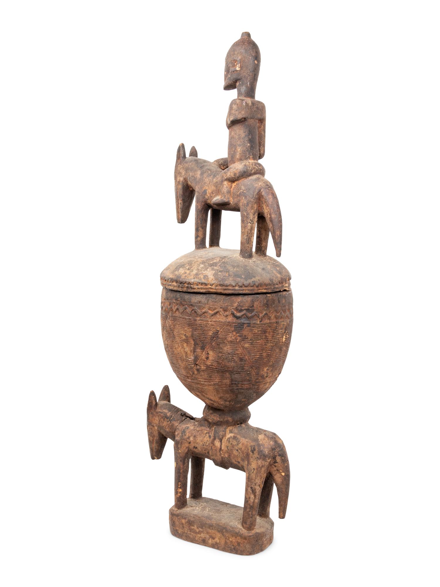 A Dogon Carved Figural Offering Bowl