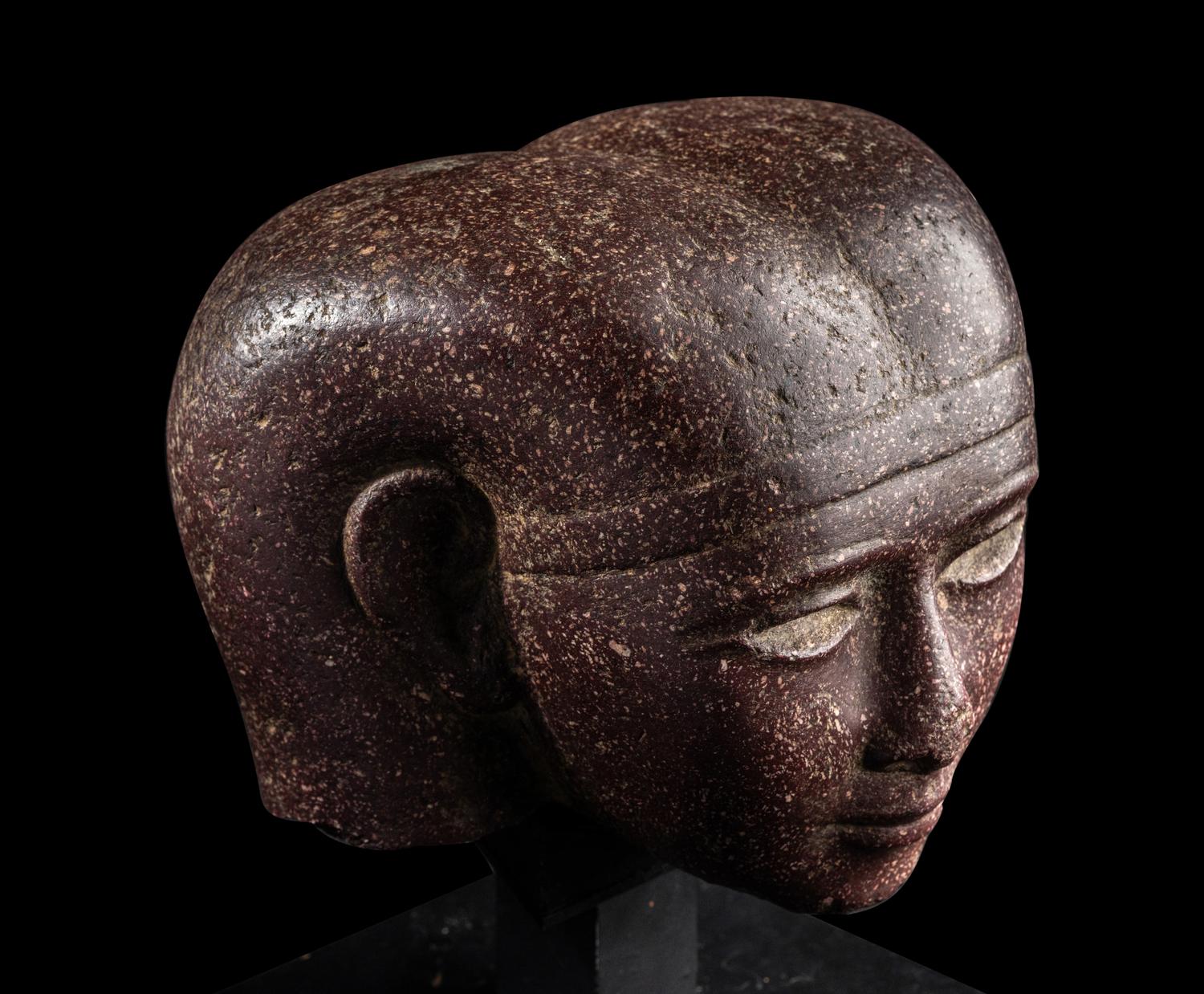A Roman Porphyry Head of an Egyptian Woman