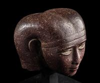 A Roman Porphyry Head of an Egyptian Woman