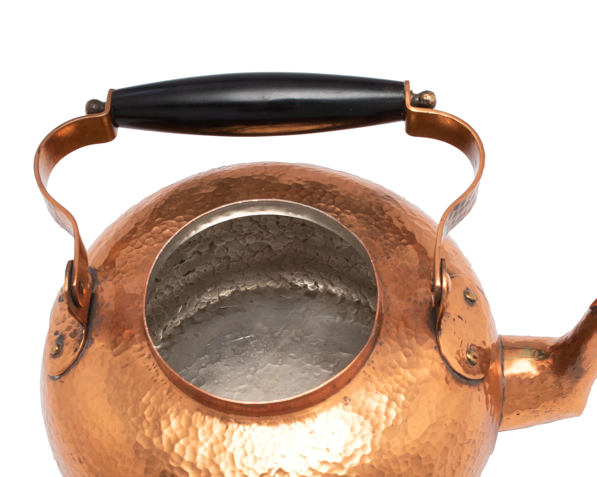 An American Hammered Copper Kettle on Stand