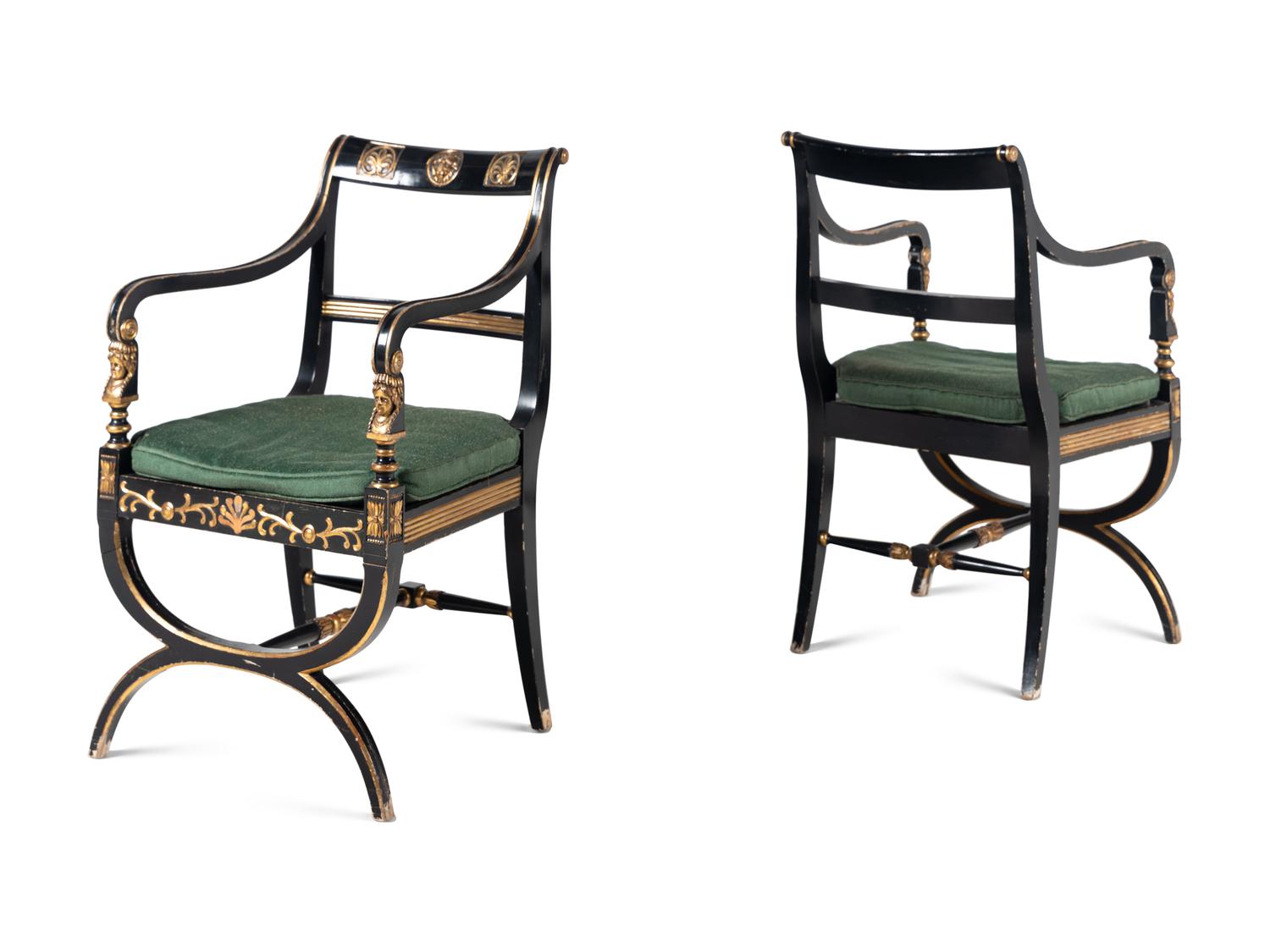 A Pair of Empire Style Ebonized and Parcel Gilt Curule Form Armchairs