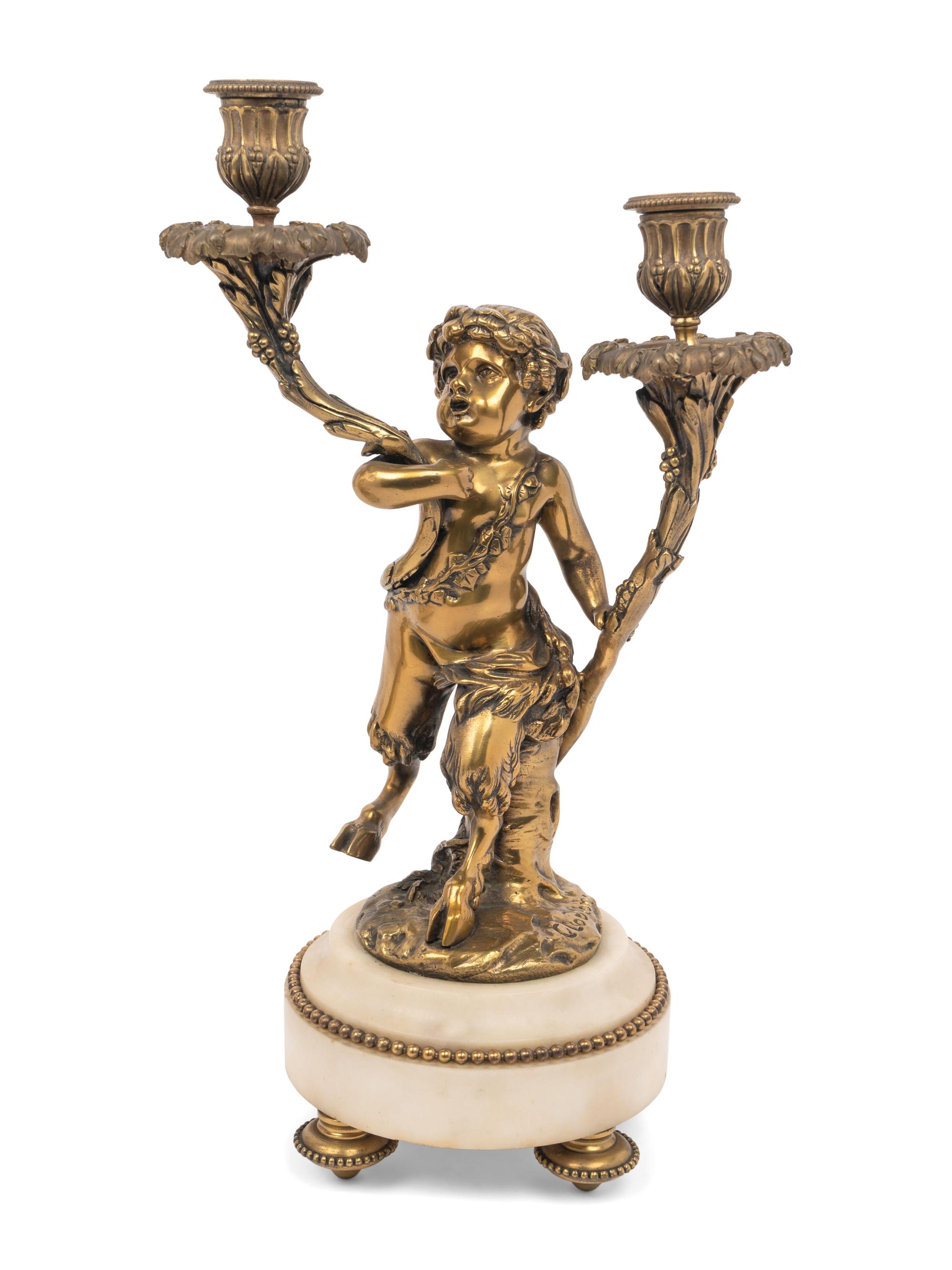 A Pair of French Gilt Bronze and Marble Figural Two-Light Candelabra