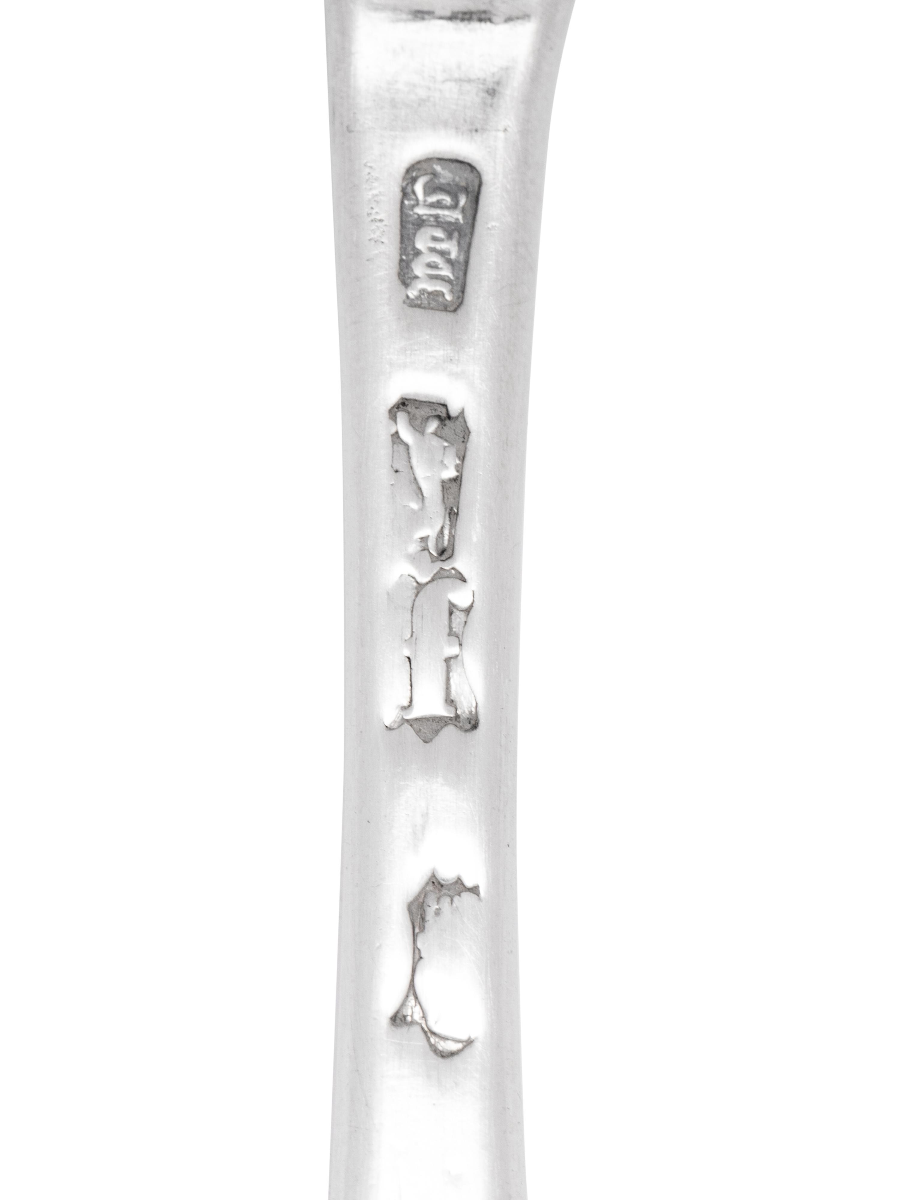 A Group of Eighteen Irish Silver Soup Spoons