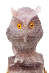 A Pair of Carved Amethyst Owls with Carved Wood Bases