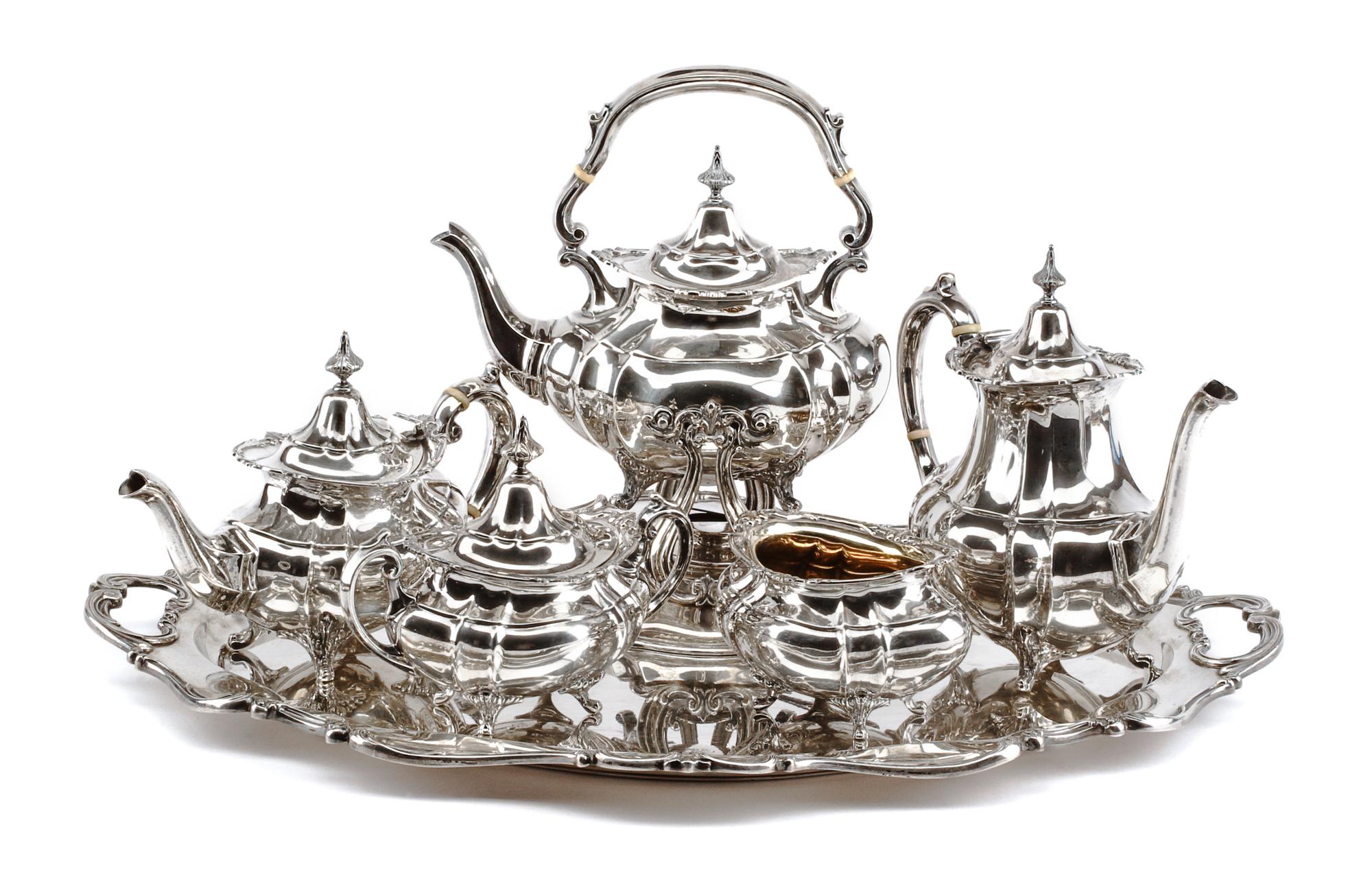 An American Silver Tea and Coffee Service, Reed & Barton, Taunton, MA, Mid-20th Century, Hampton Court pattern, comprising a water kett