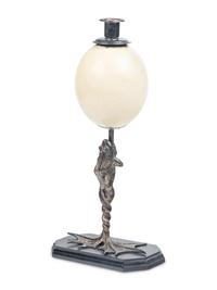 An Anthony Redmile Silvered Metal and Ostrich Egg Frog-Form Candlestick