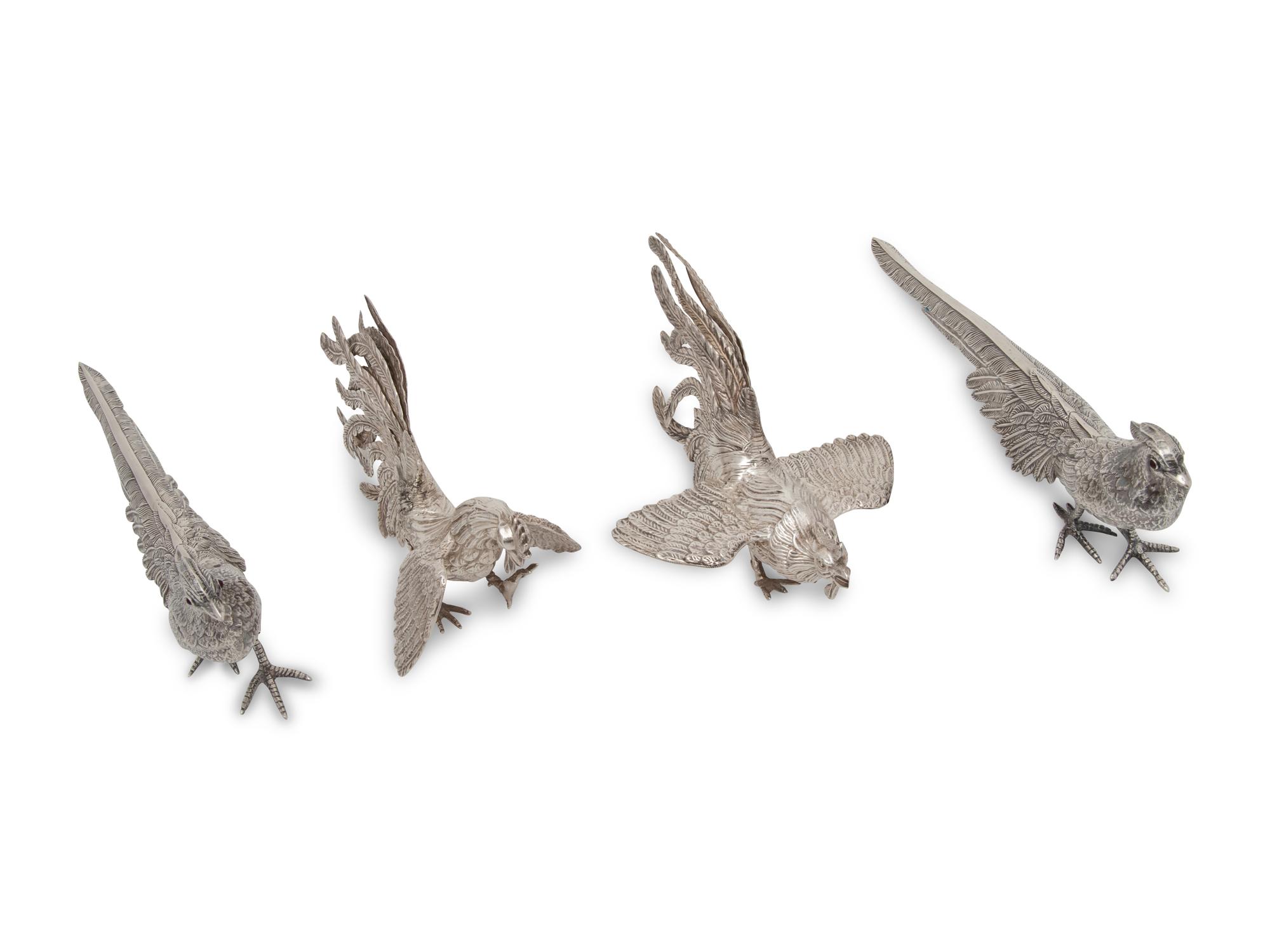 A Group of Four Silver Ornithological Table Ornaments