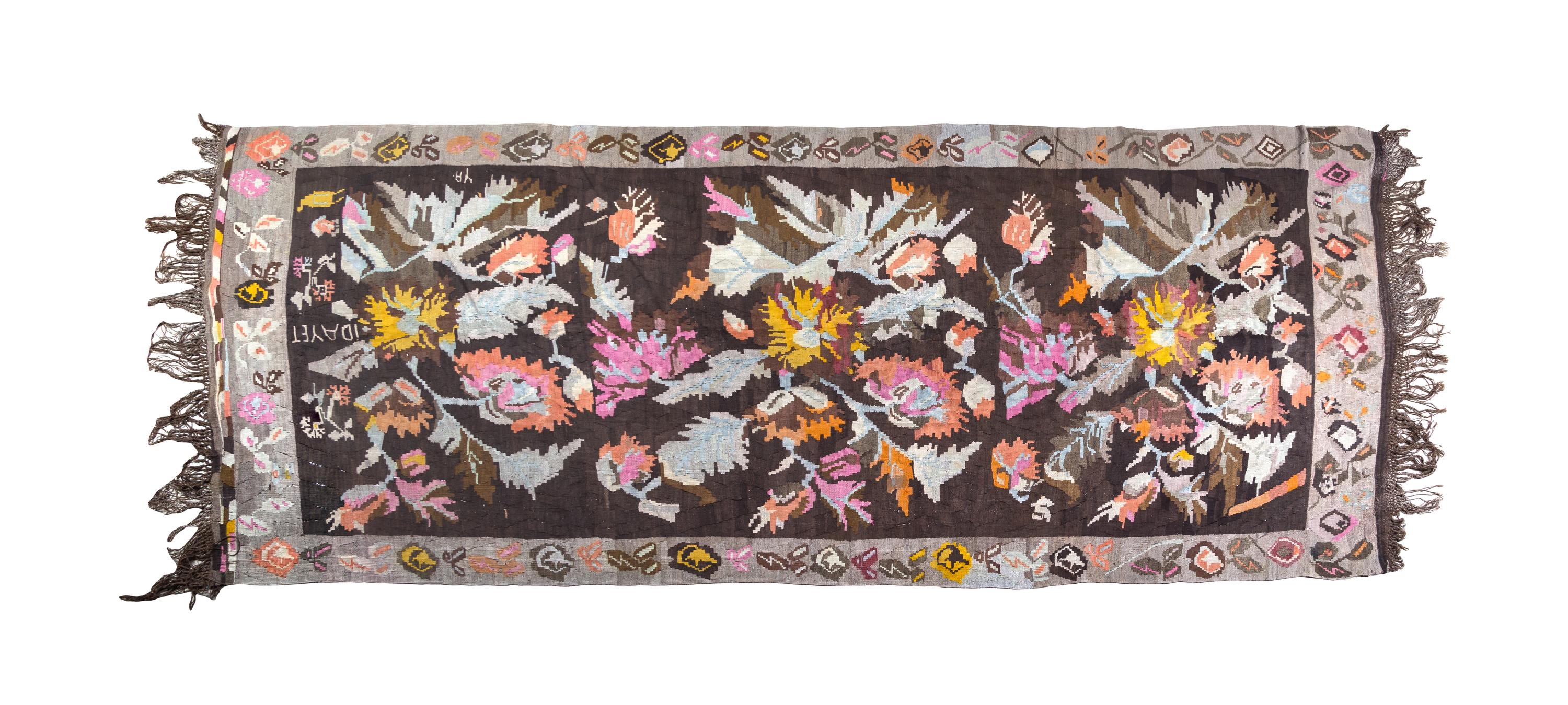 A Northwest Persian Flatweave Wool Carpet 12 feet 2 inches x 5 feet 7 inches.