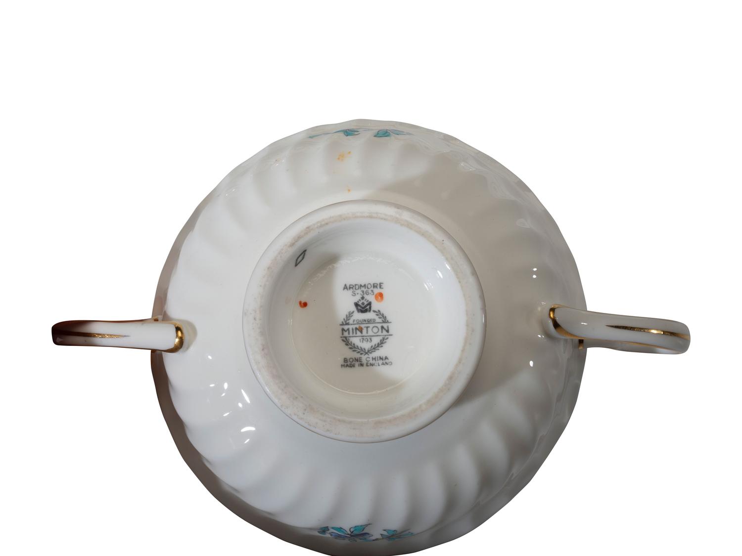 A Minton Porcelain Dinner Service